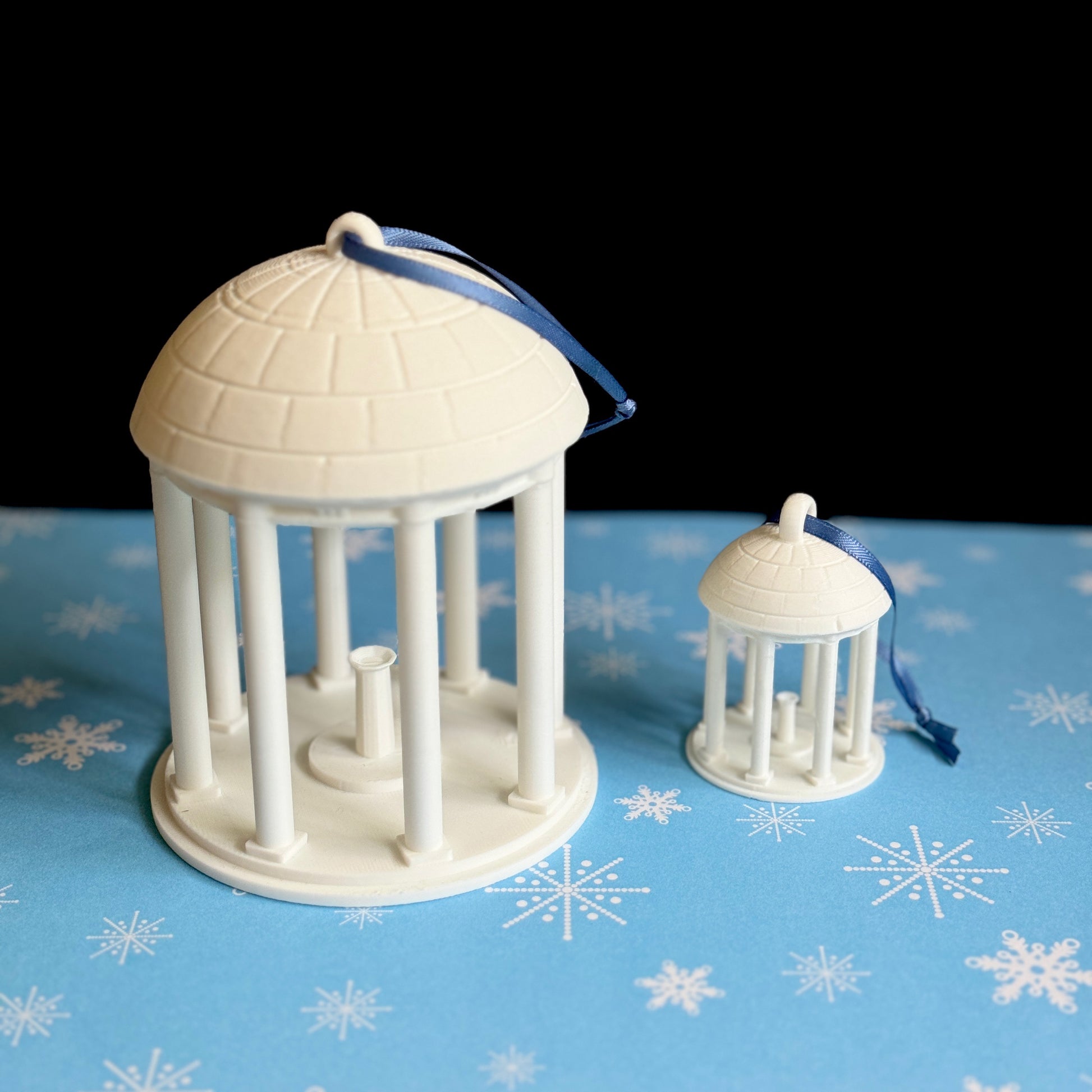 Two of the UNC Tar Heels ornaments, shown side by side.