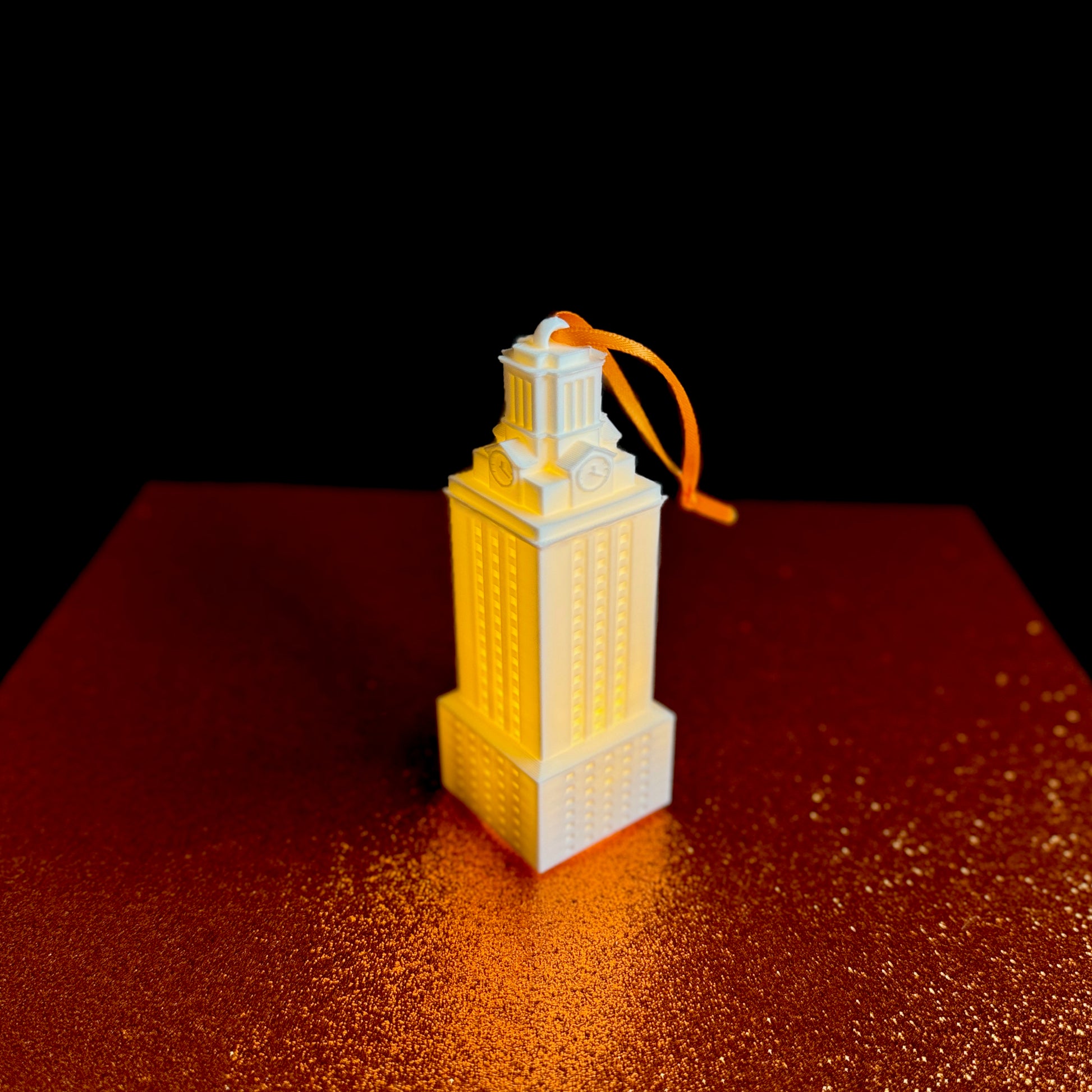 The UT Austin lighted ornament, designed in honor of the UT Tower.