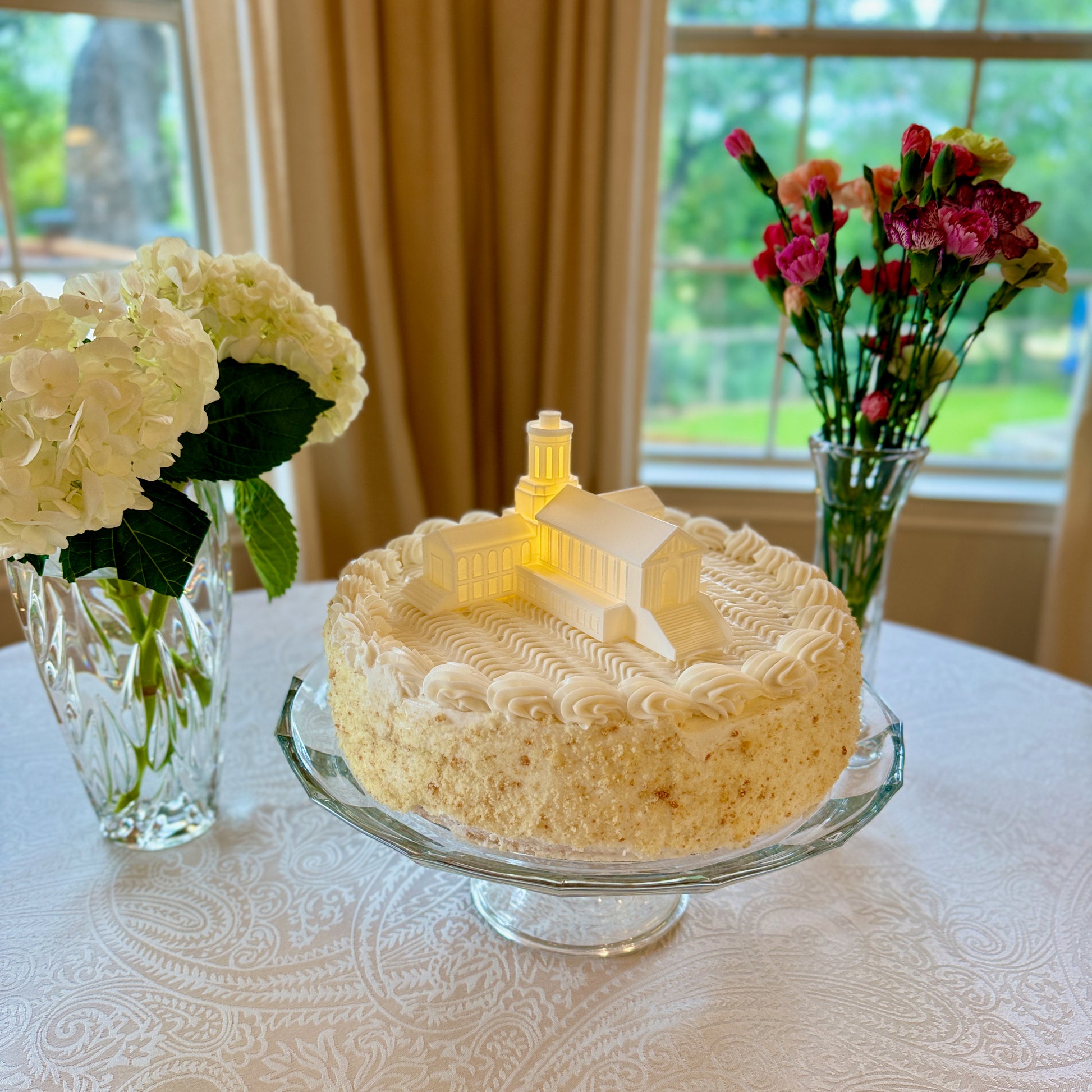 The Carnegie Mellon cake topper, shown on a graduation cake.