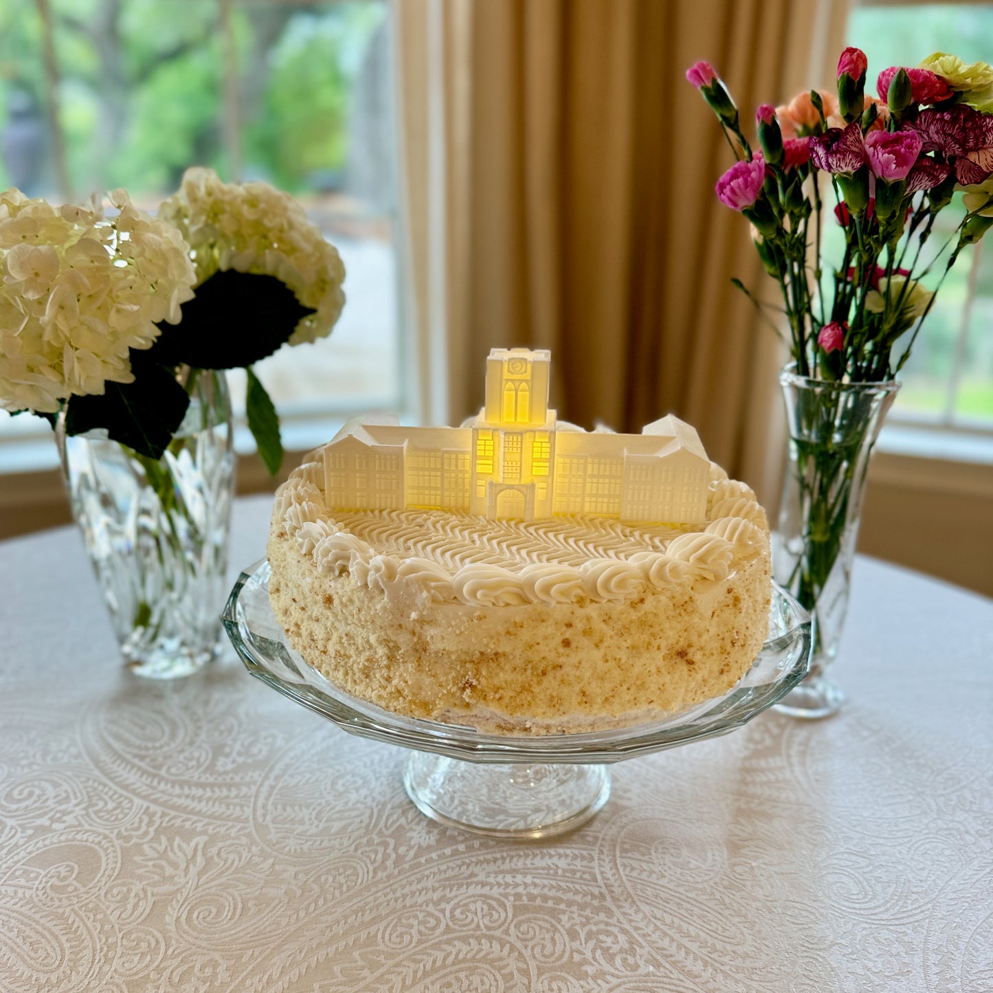 The University of Tennessee cake topper, designed as a light of the Ayers Hall campus building.