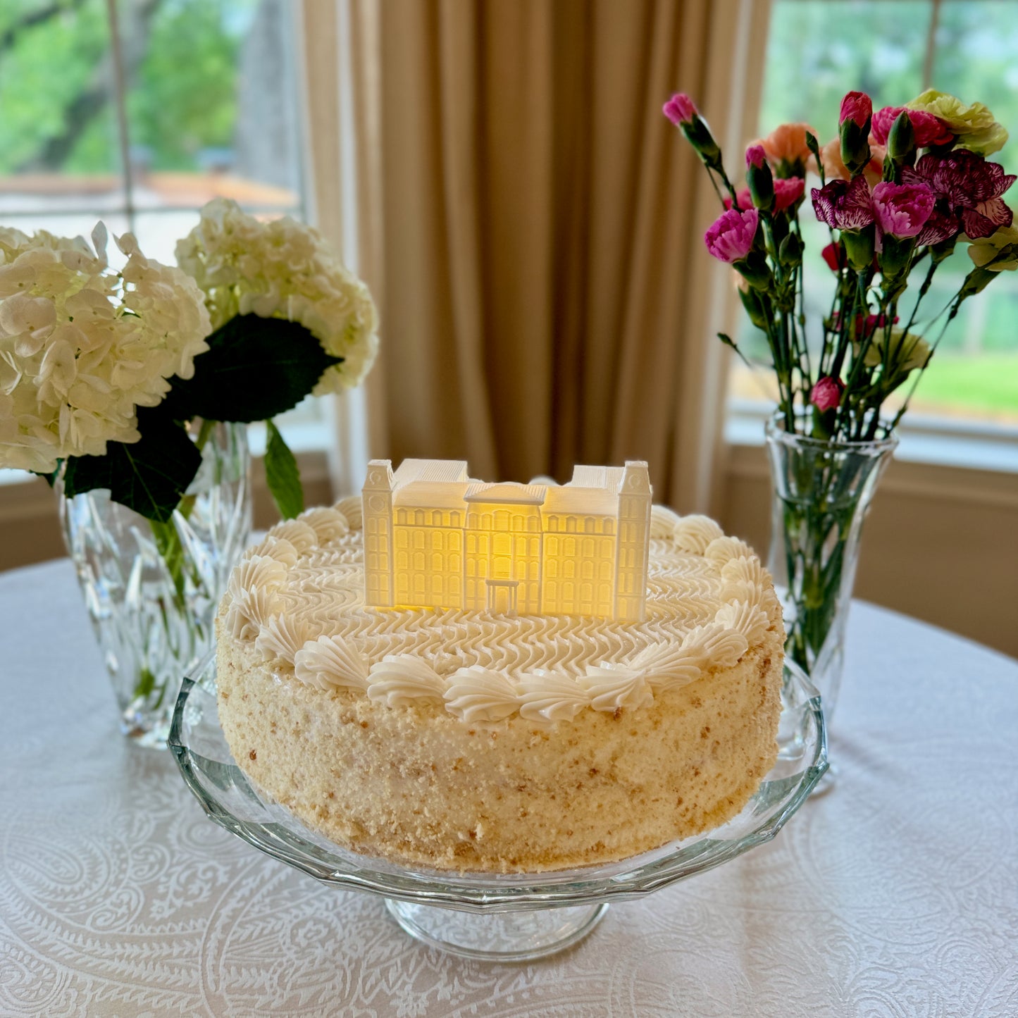 The University of Arkansas college cake topper, shown on a groom's cake.