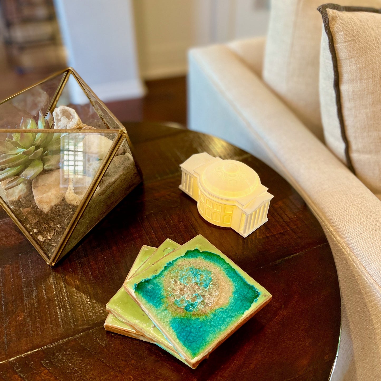 The UVA home decoration, designed as a replica of the UVA rotunda and shown on a side table.