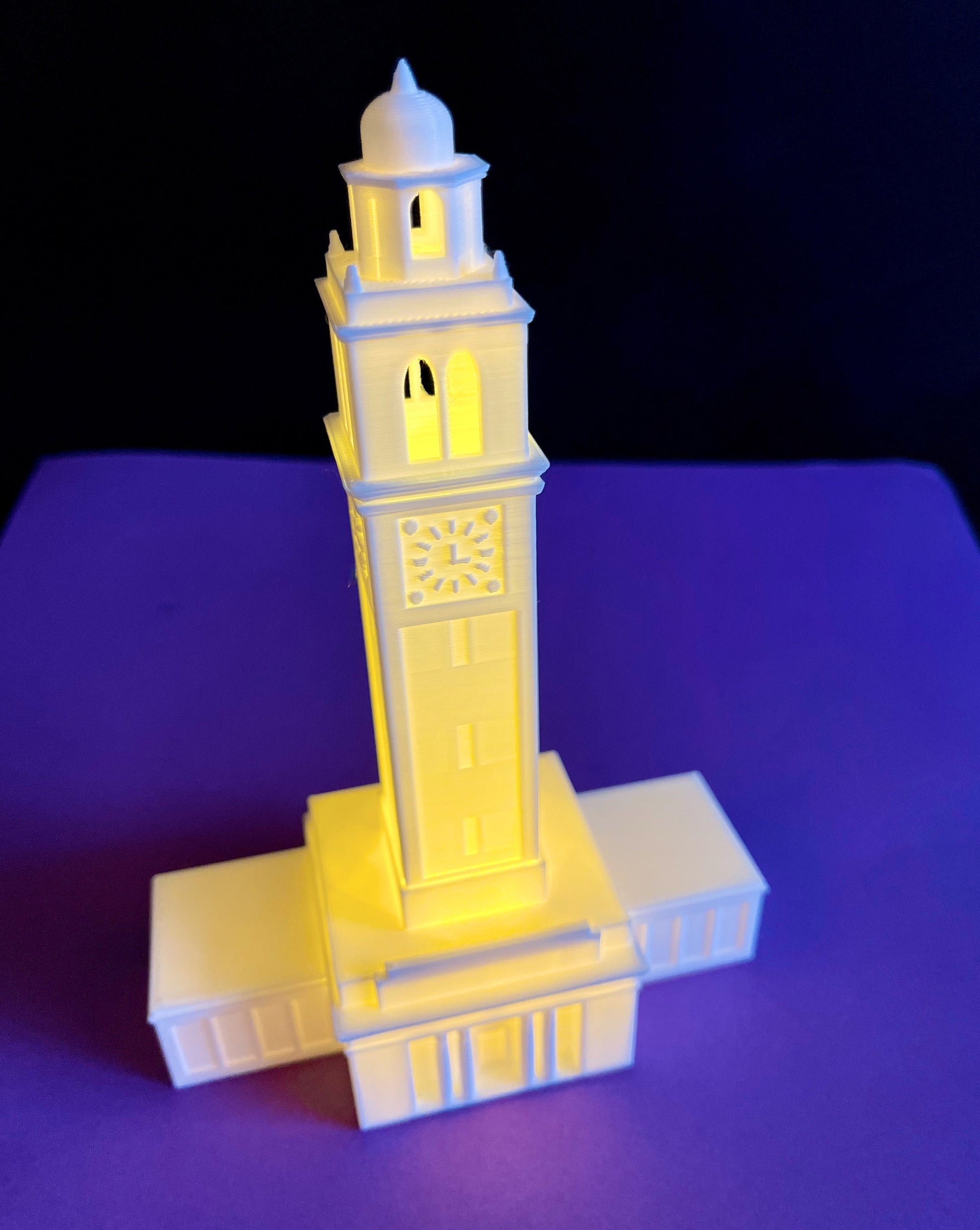 The LSU night light, shown against a purple background.