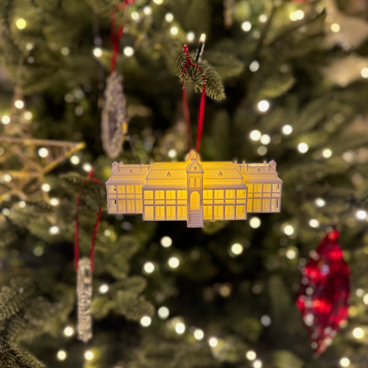 The lighted University of Arizona ornament depicting the Old Main building.