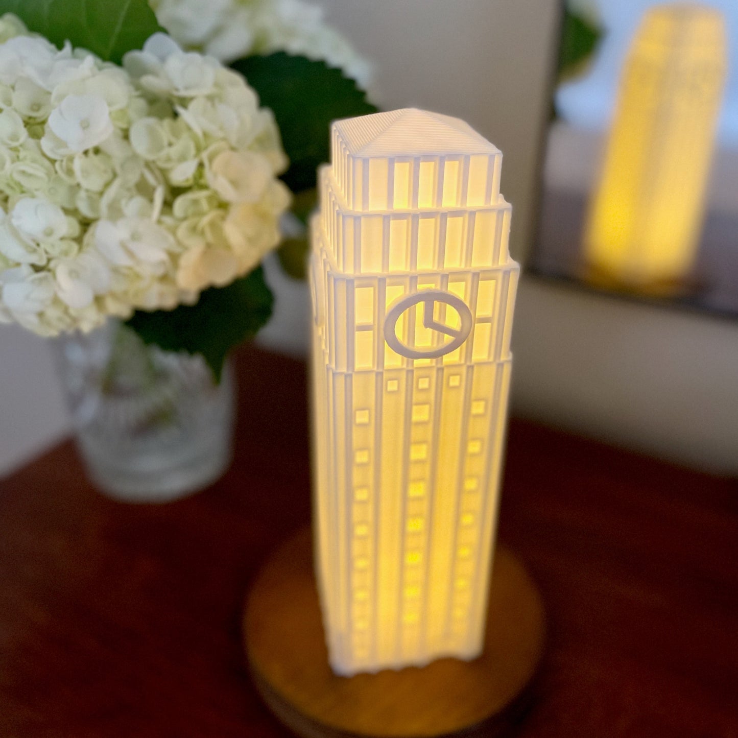 The University of Michigan Wolverines lamp, shown on a bedroom side table.