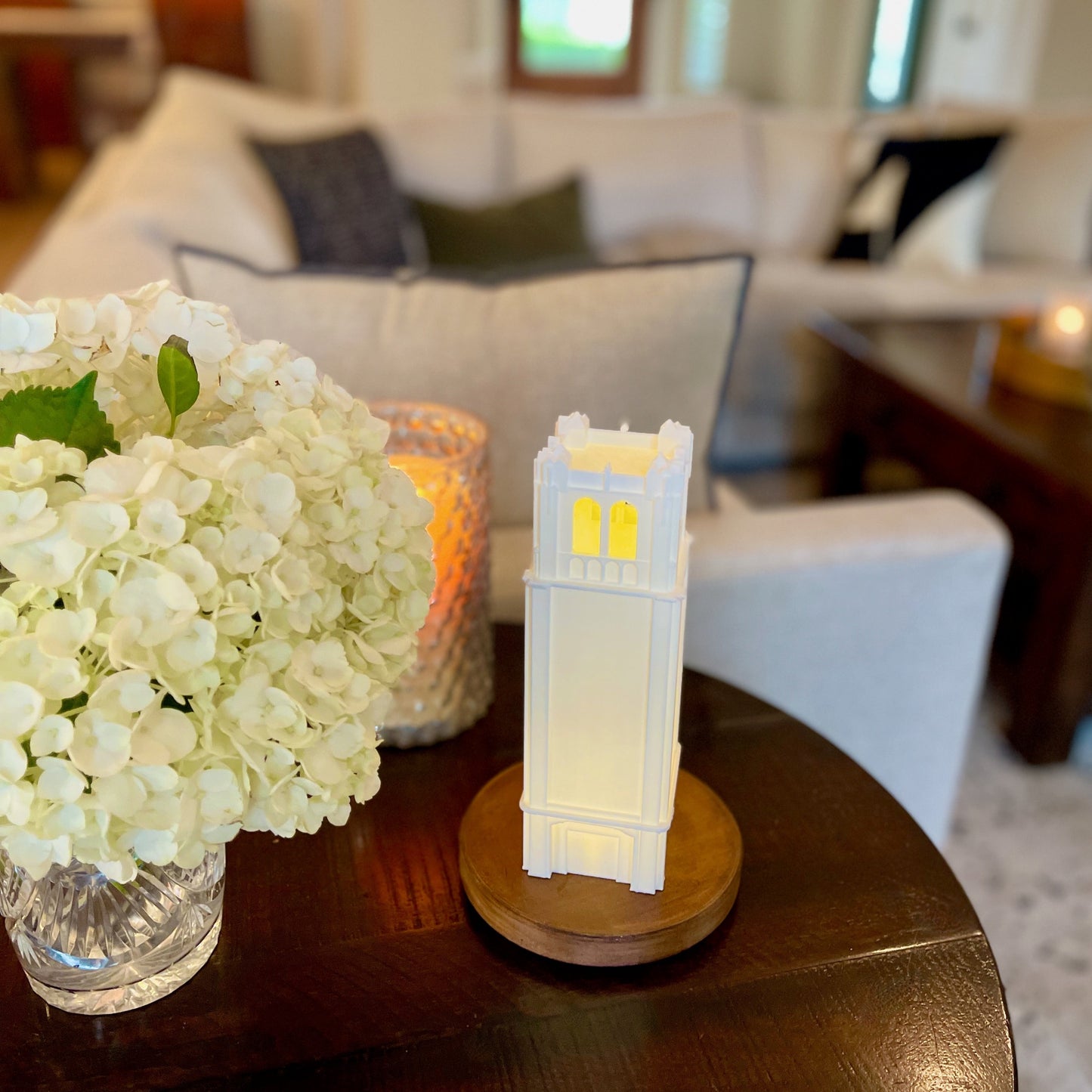 The Century Tower light from the University of Florida, shown styled in a living room.