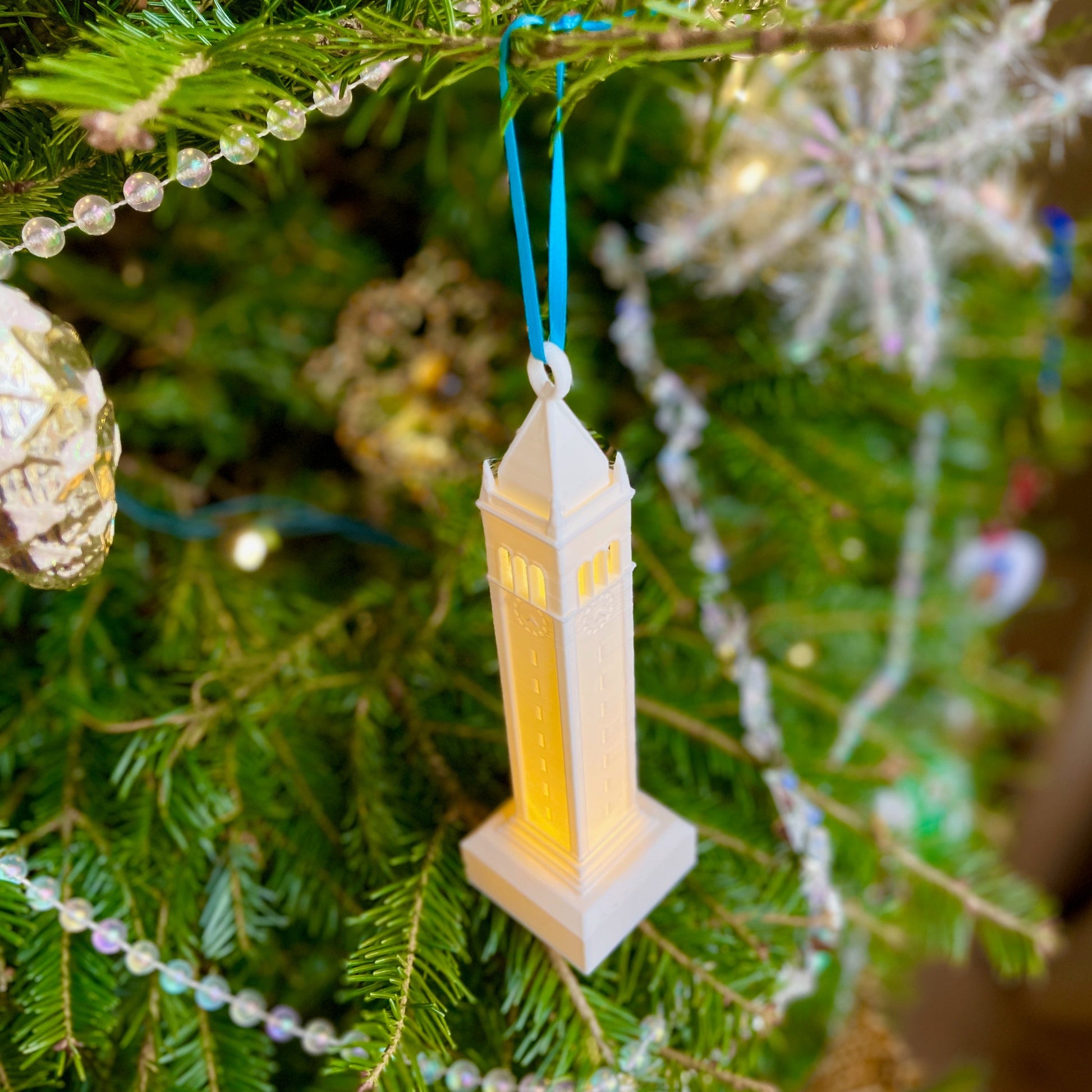 Top view of the Berkeley tower ornament, shown on a Christmas tree.