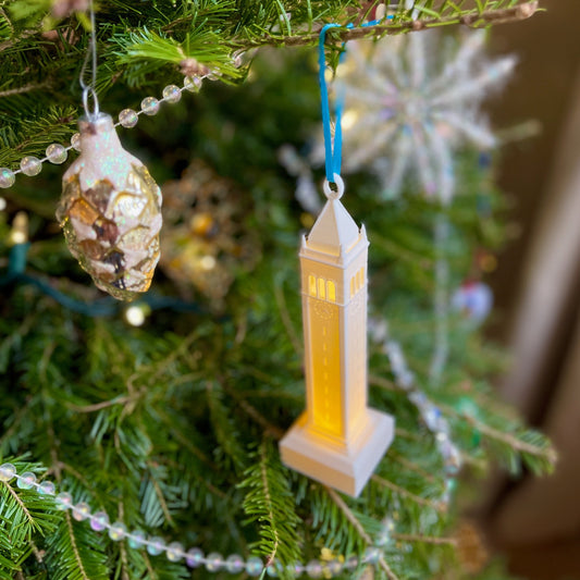 The lighted Berkeley ornament, shown on a Christmas tree decorated for the holidays.