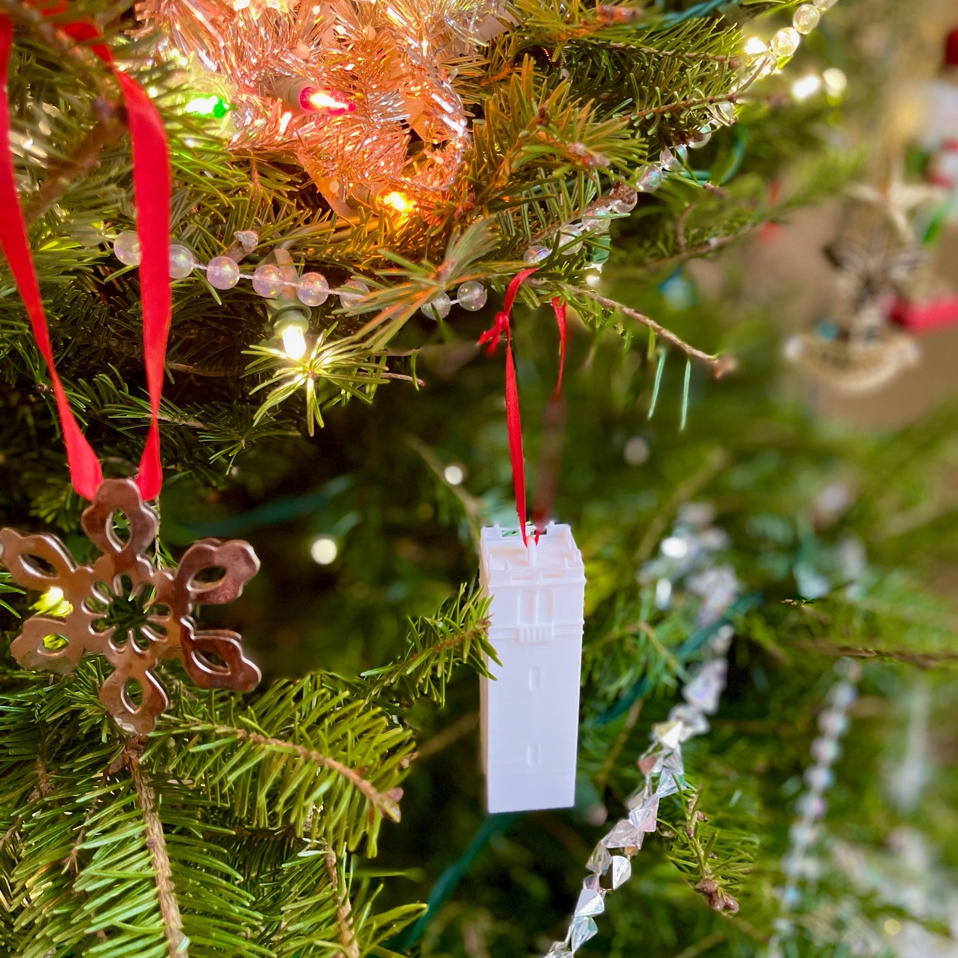 The University of Wisconsin Christmas decoration, shown on a Wisconsin Christmas tree.