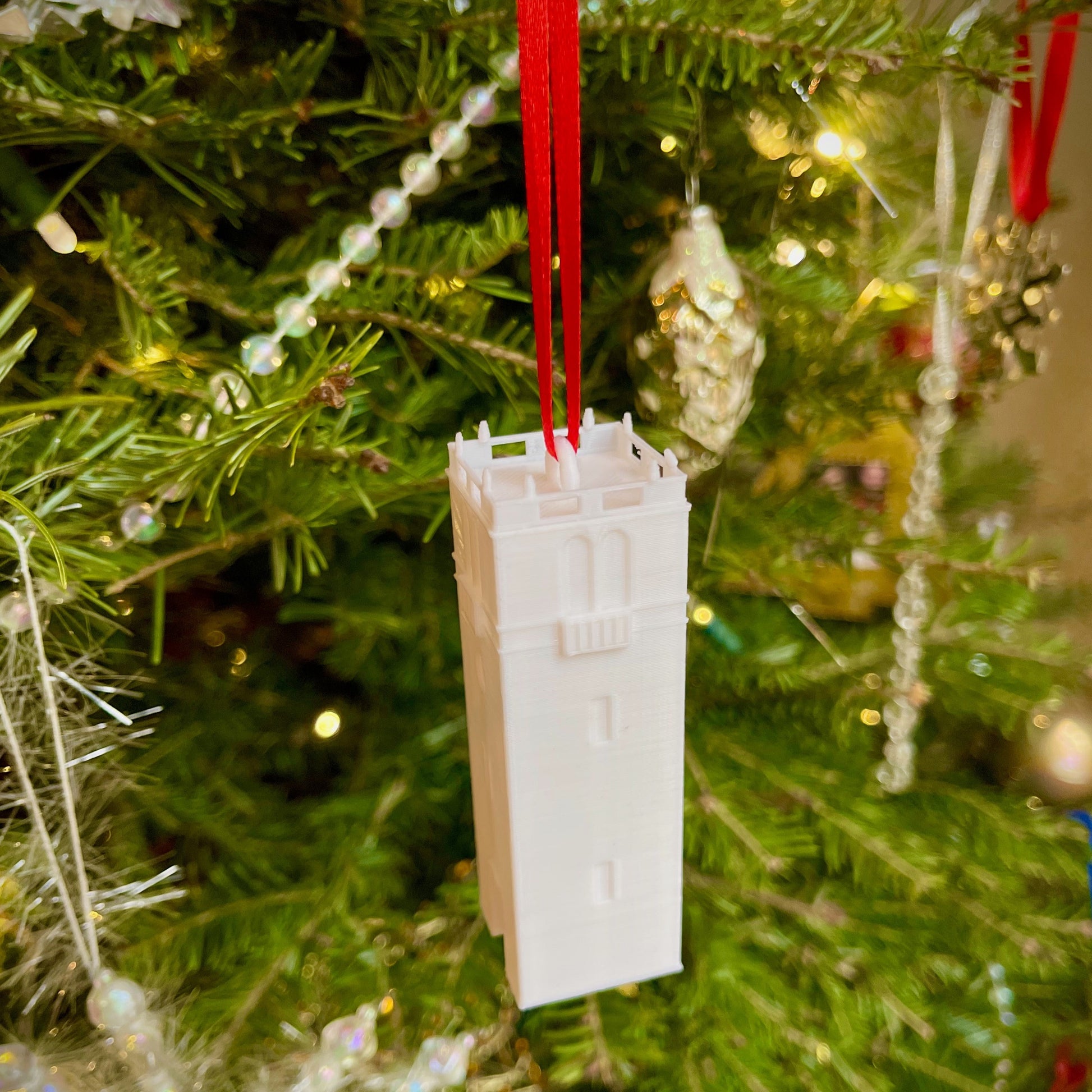 The University of Wisconsin Carillon Tower ornament, displayed on a Christmas tree.