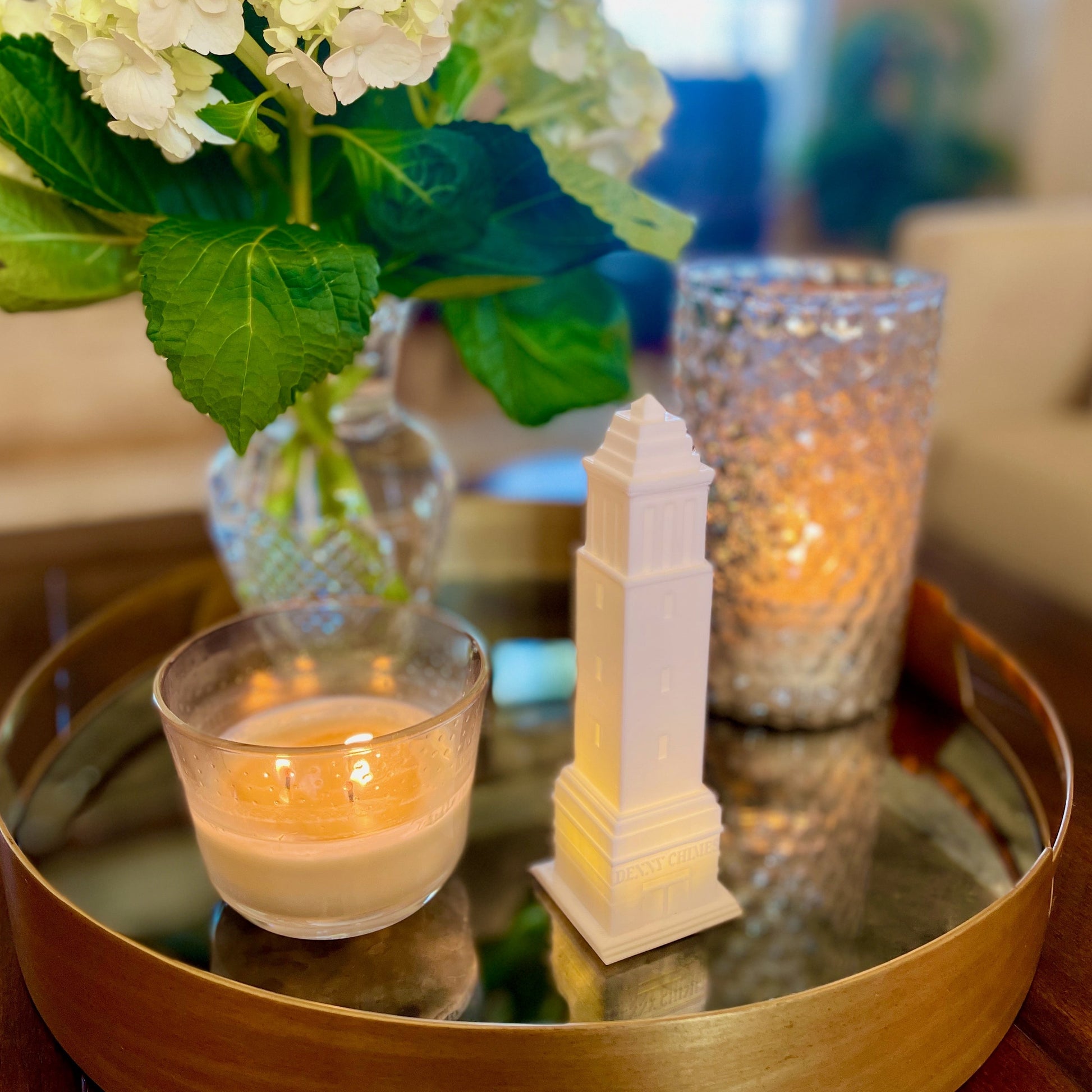 The University of Alabama Denny Chimes light, used as home decor on a tiered tray.