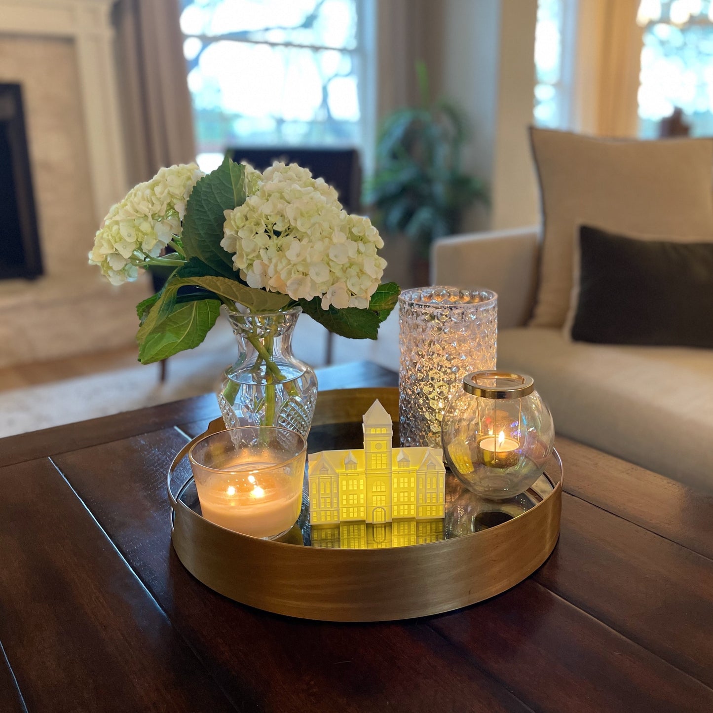 The Clemson University Tillman Hall lighted figurine, shown on a living room tray.