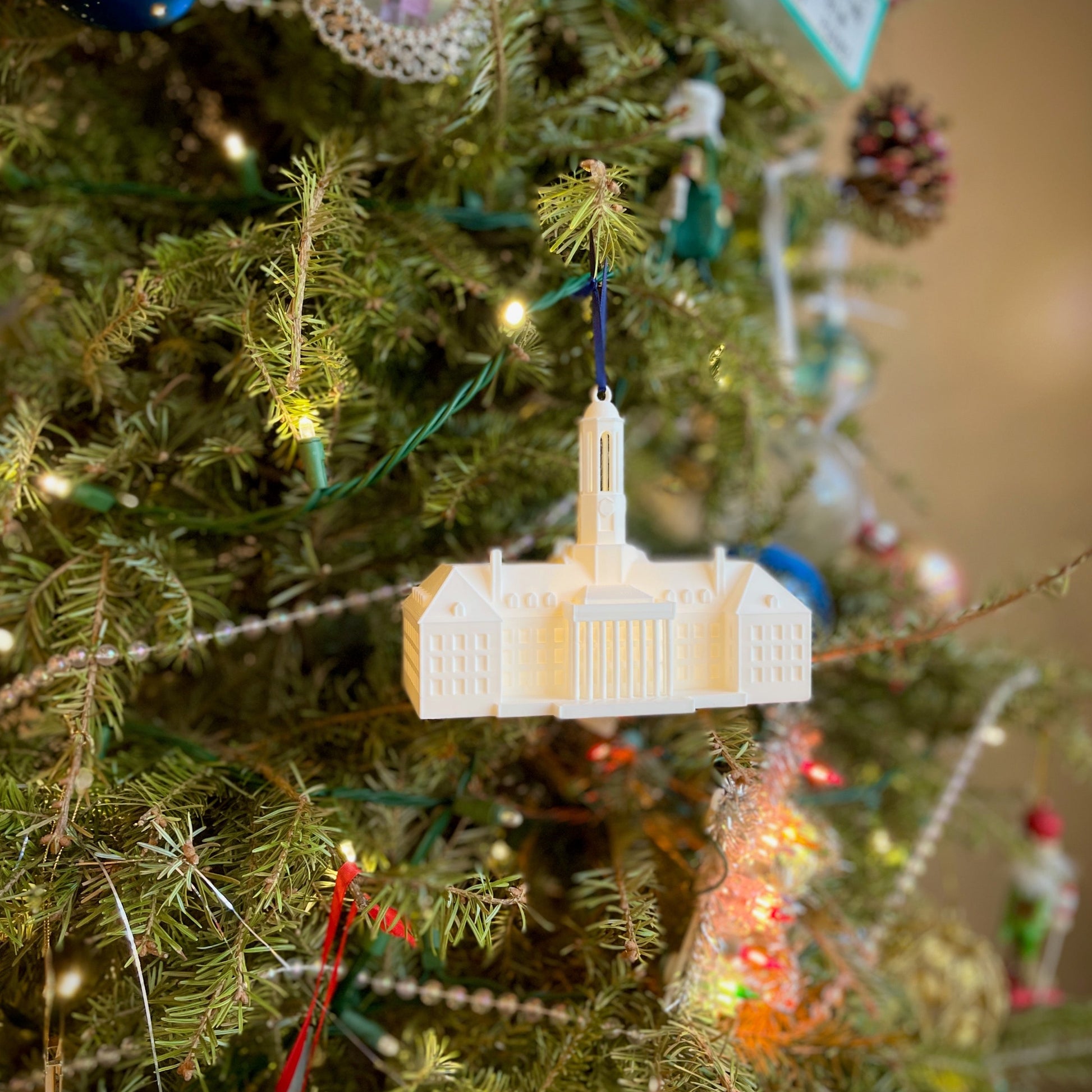 The Penn State lighted Christmas decoration, shown on a tree decorated for the Holidays.