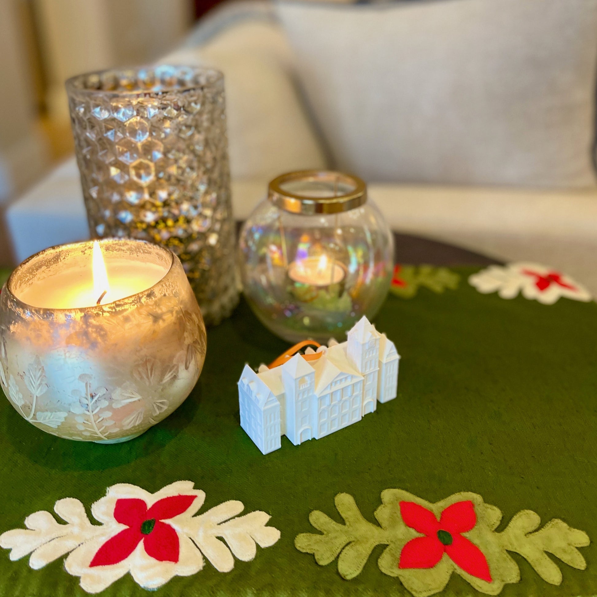 The Auburn University ornament, designed in honor of Samford Hall and shown in a home decorated for Christmas.