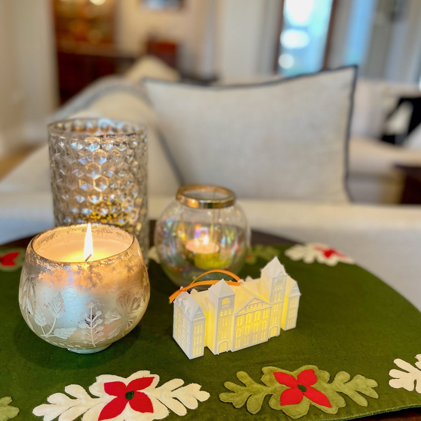 The lighted Auburn University ornament, shown in a home decorated for Christmas.