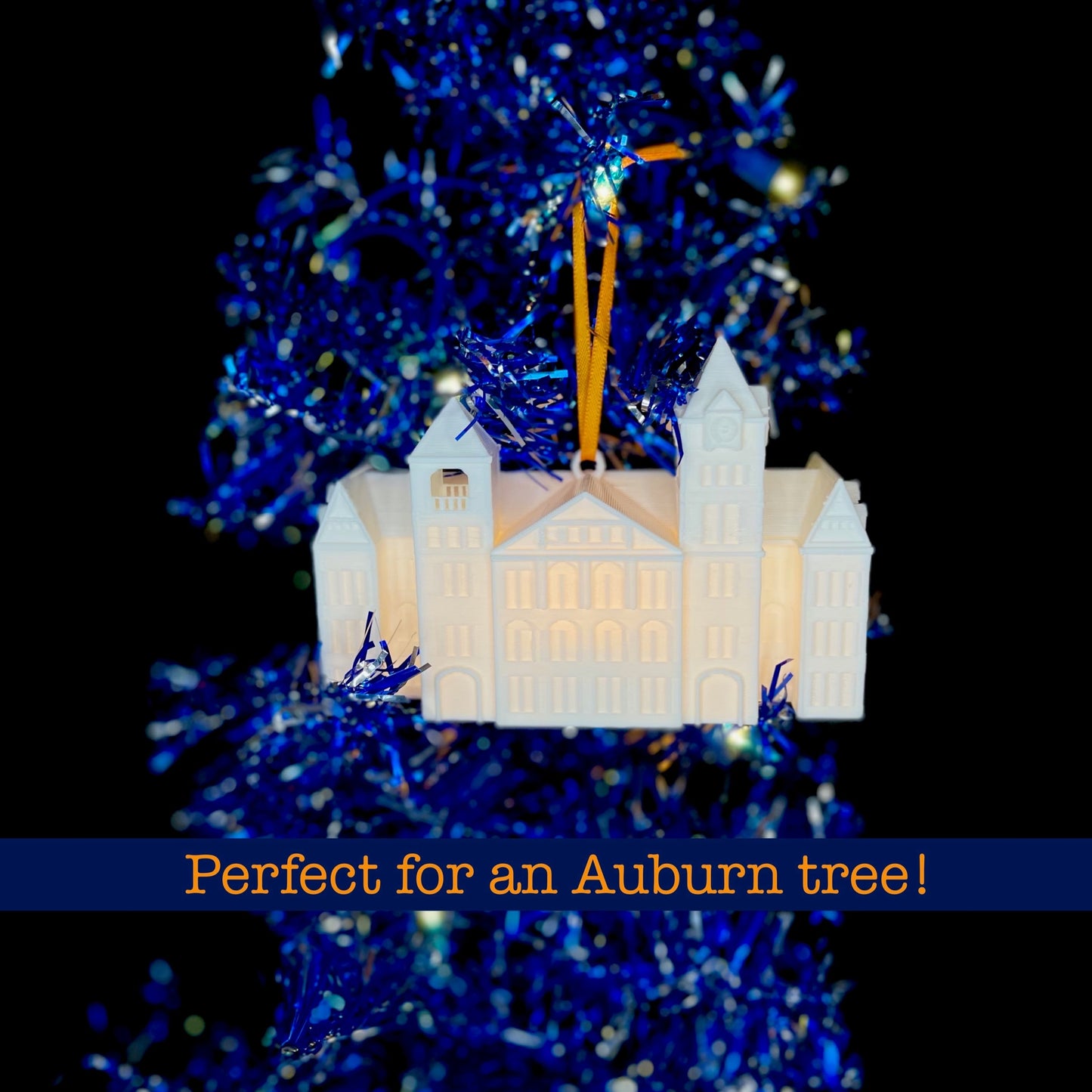 The lighted Auburn University ornament, shown on an Auburn tree.