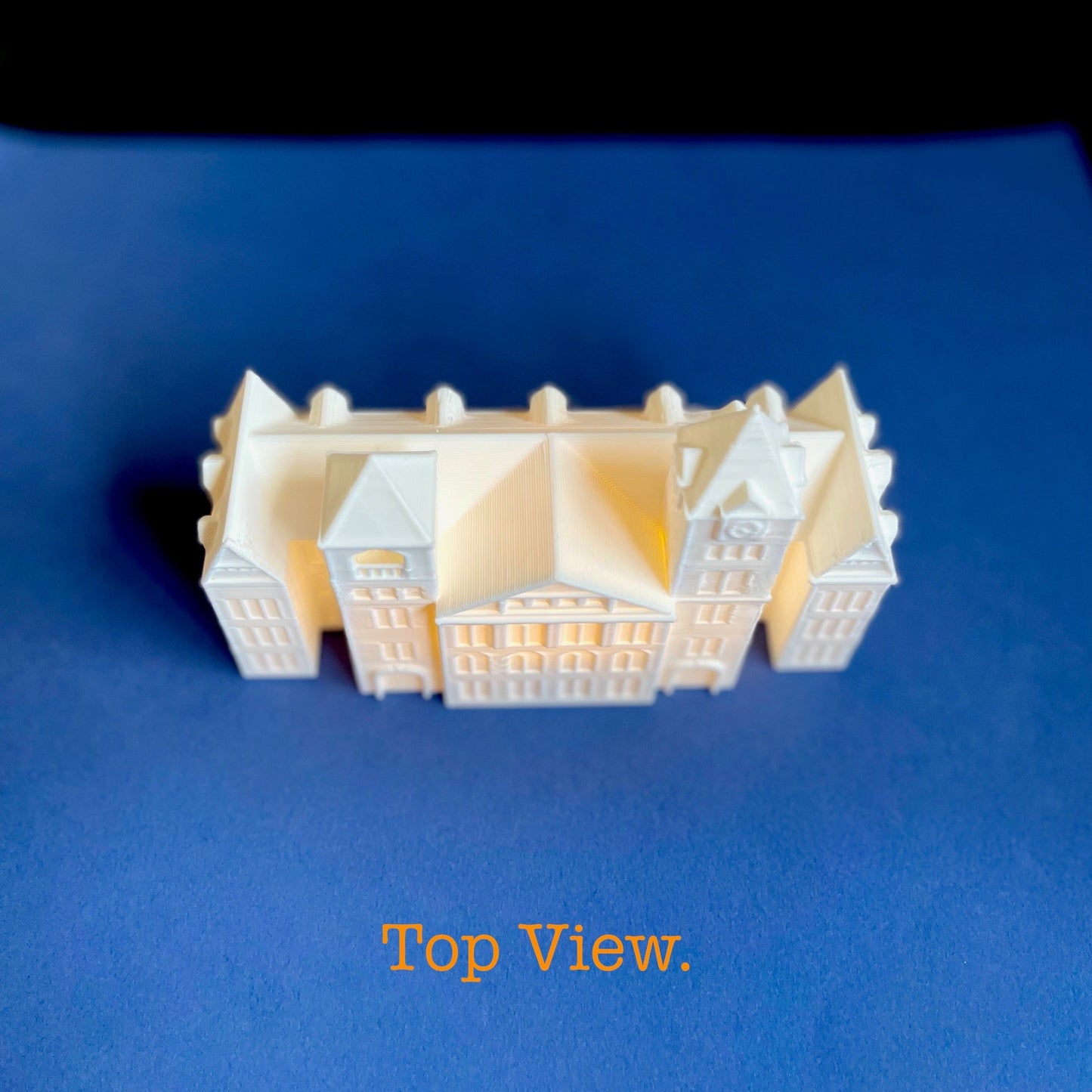 Top view of the lighted Samford Hall figurine from Auburn University, used as an Auburn graduation gift.