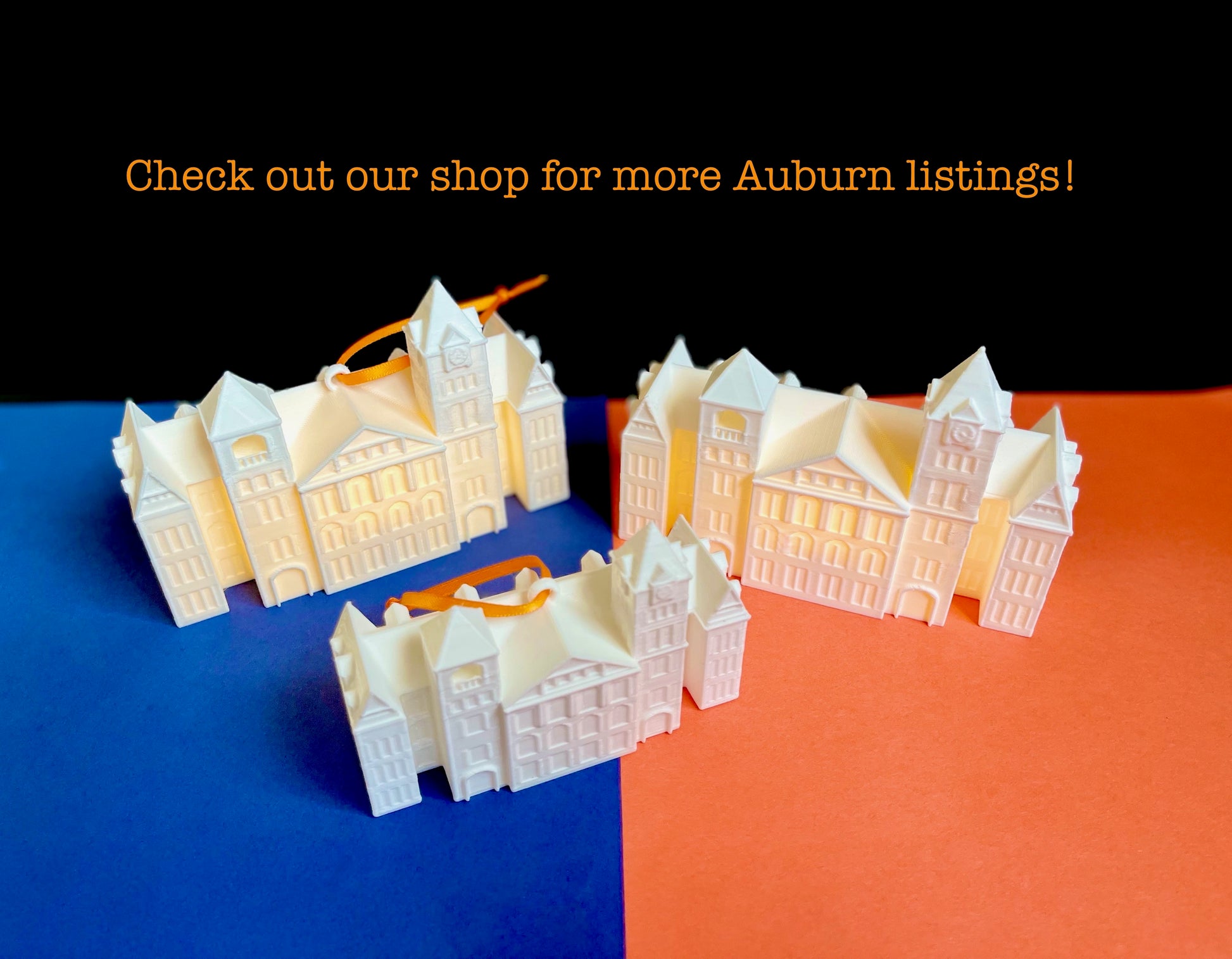 The Auburn University lighted ornament, shown next to the Auburn figurines.