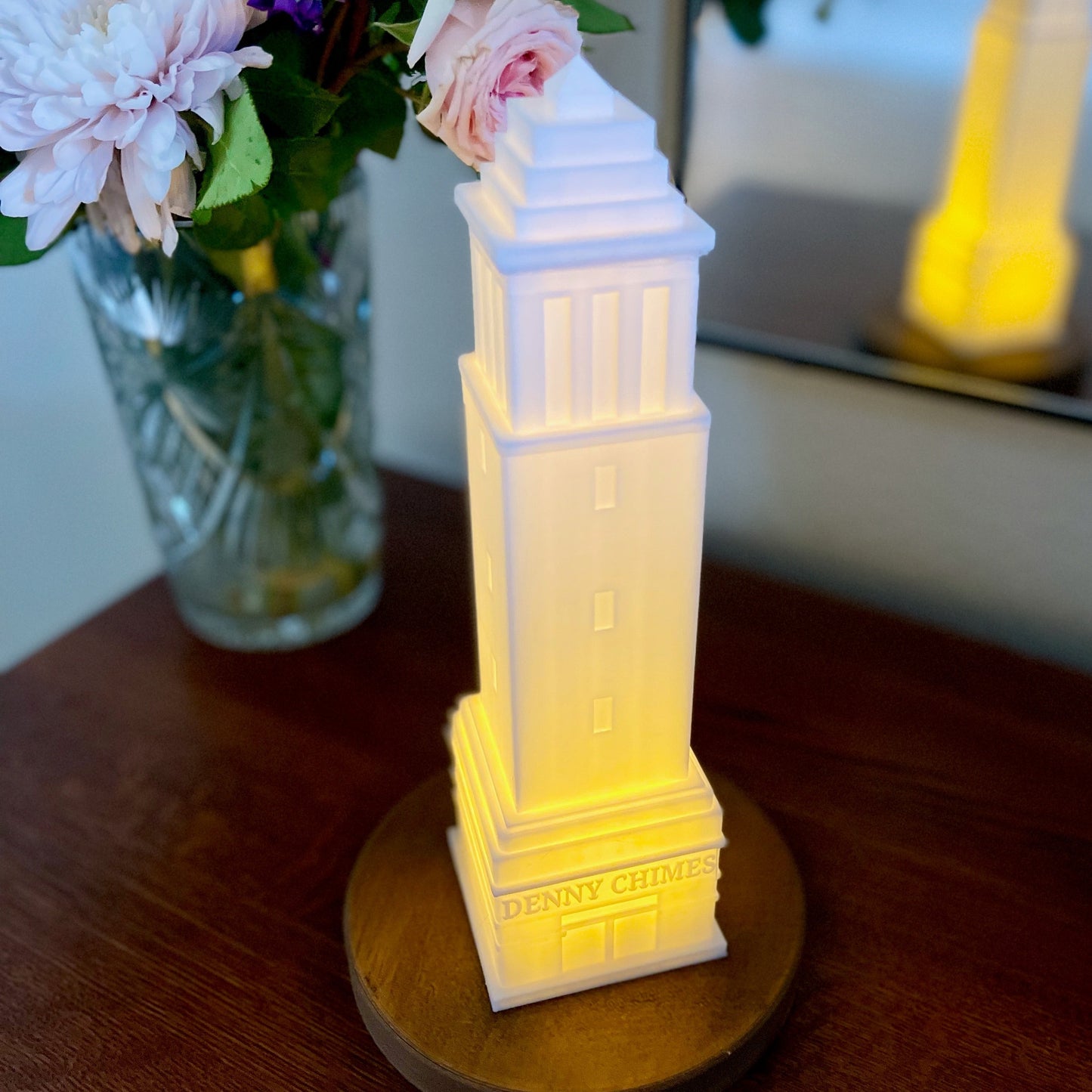 Closeup view of the University of Alabama light, used as a dorm decoration and shown on a side table.