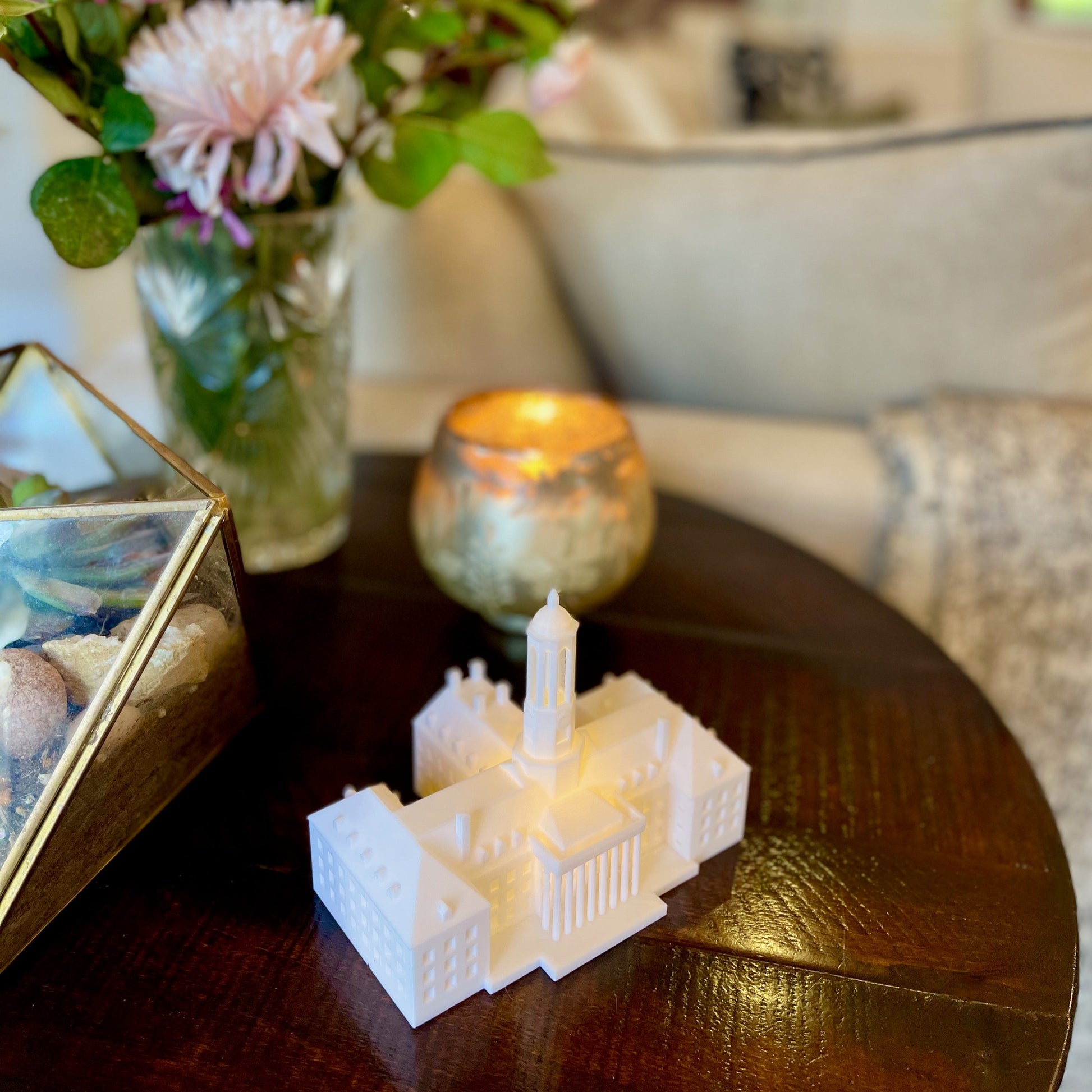 The lighted Penn State home decor item, shown on a living room side table.