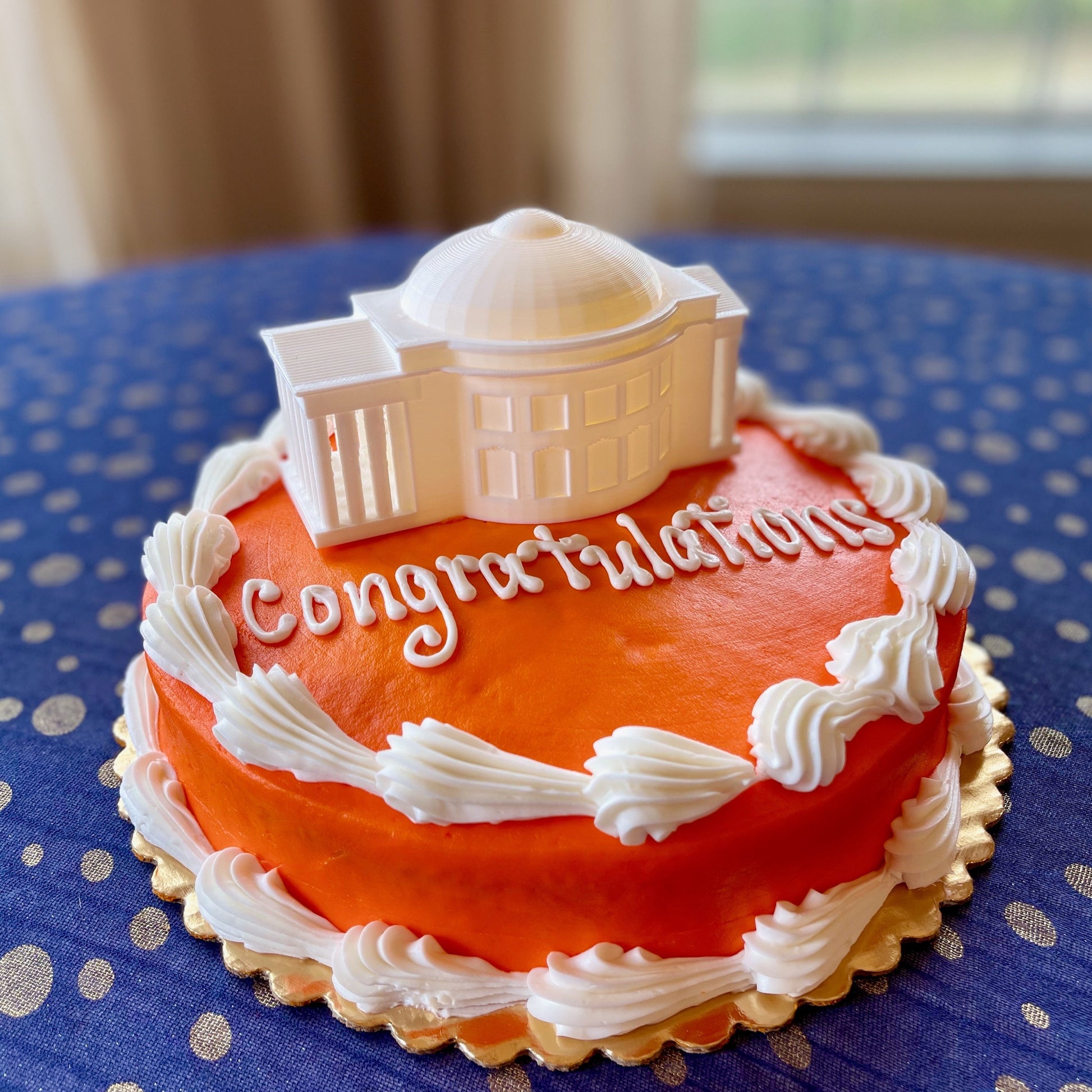 The Virginia Cavaliers cake topper, shown on a UVA graduation cake.