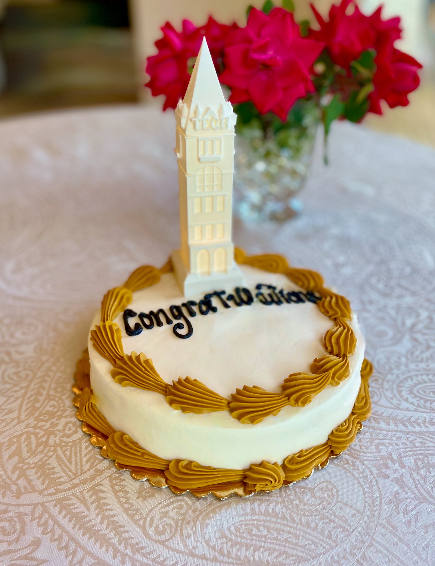 The Georgia Tech Tower cake topper, shown on a Georgia Tech groom's cake.