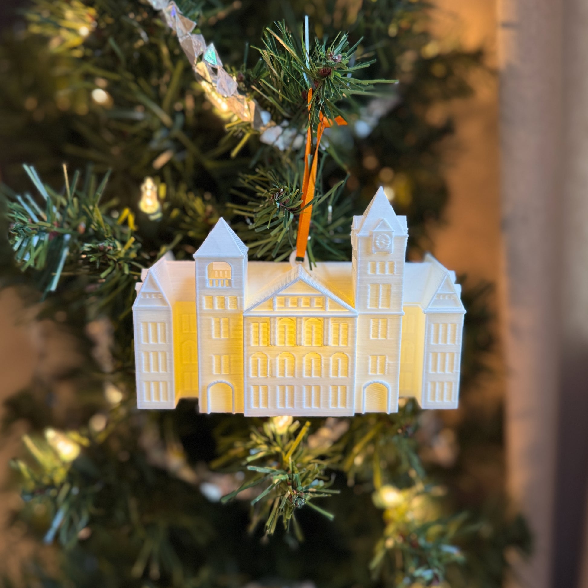 Lighted Auburn ornament of Samford Hall, shown on an Auburn University tree decorated for the Holidays.