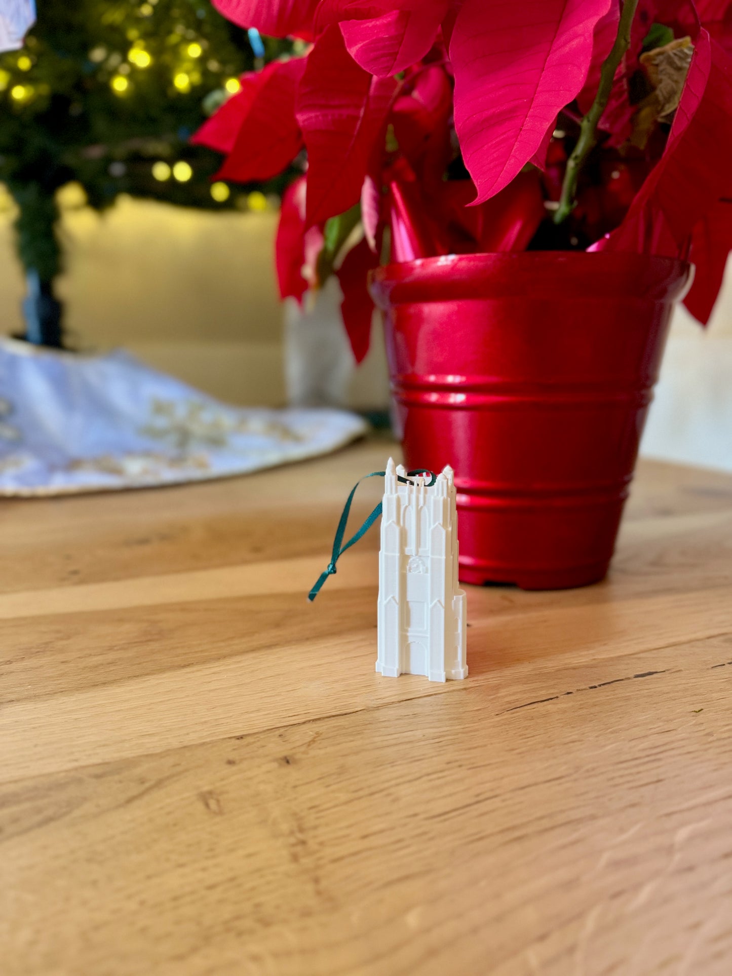 Michigan State Spartans ornament shown in a home decorated for Christmas.