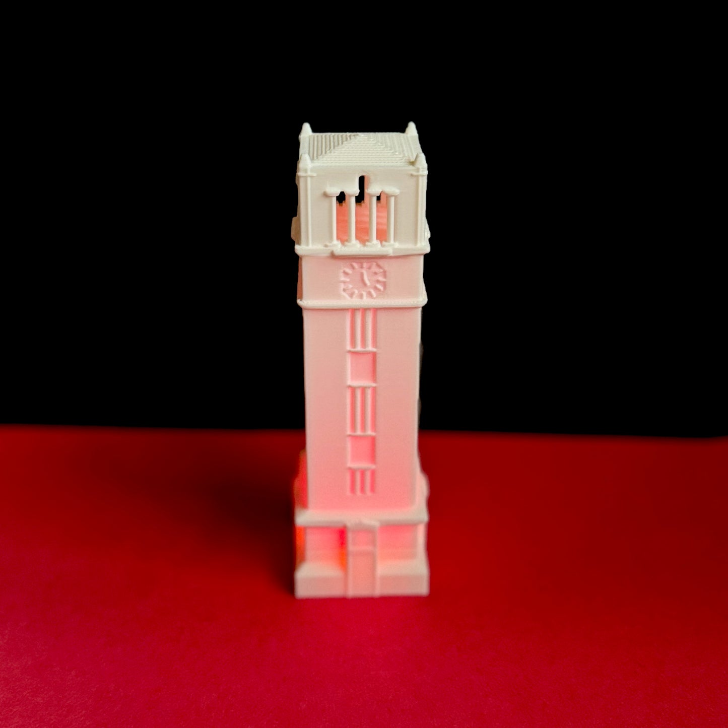 Front view of the NC State night light, shown in red.