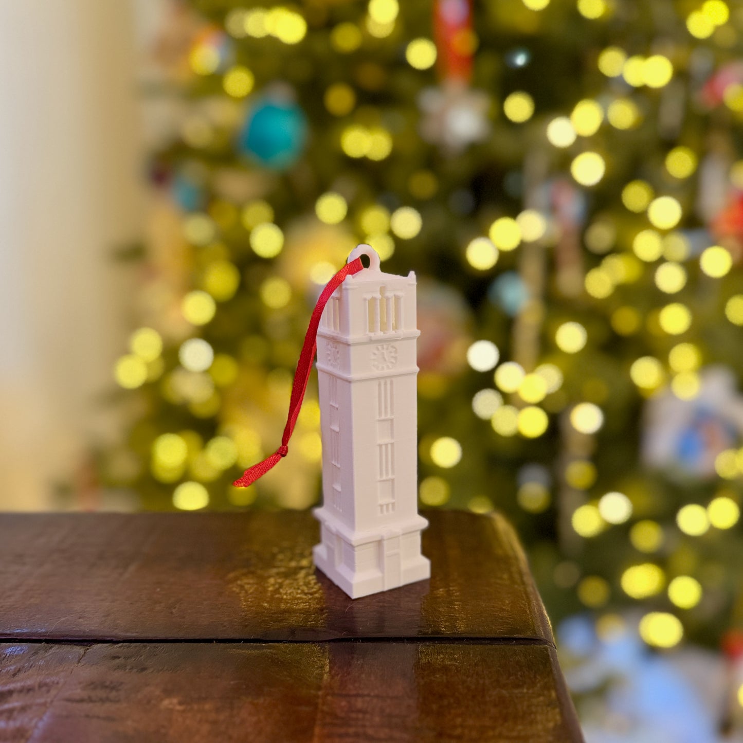 The NC State ornament, shown in a home decorated for the Holidays.