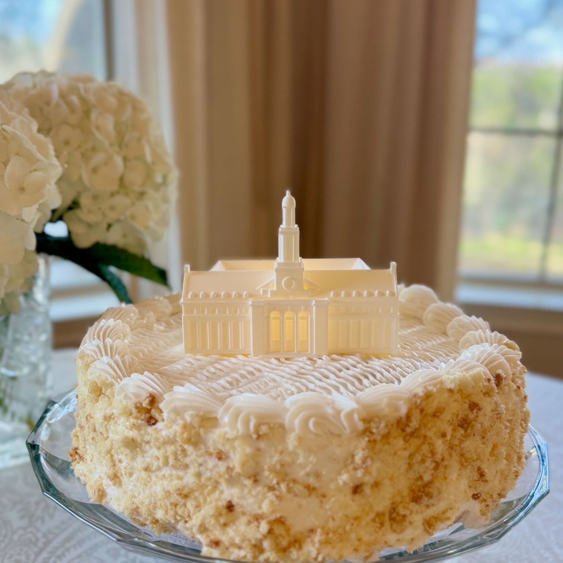 The OSU cake topper design, shown on a graduation cake.