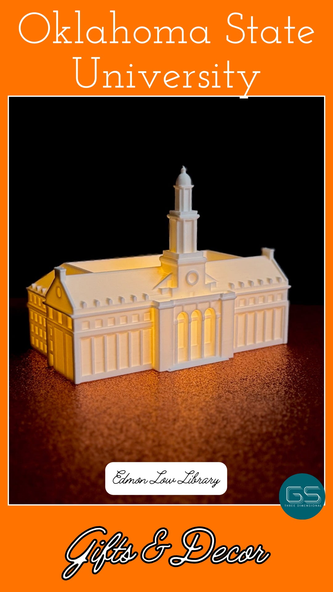 Oklahoma State University figurine of the OSU Edmon Low Library, shown against an orange background.