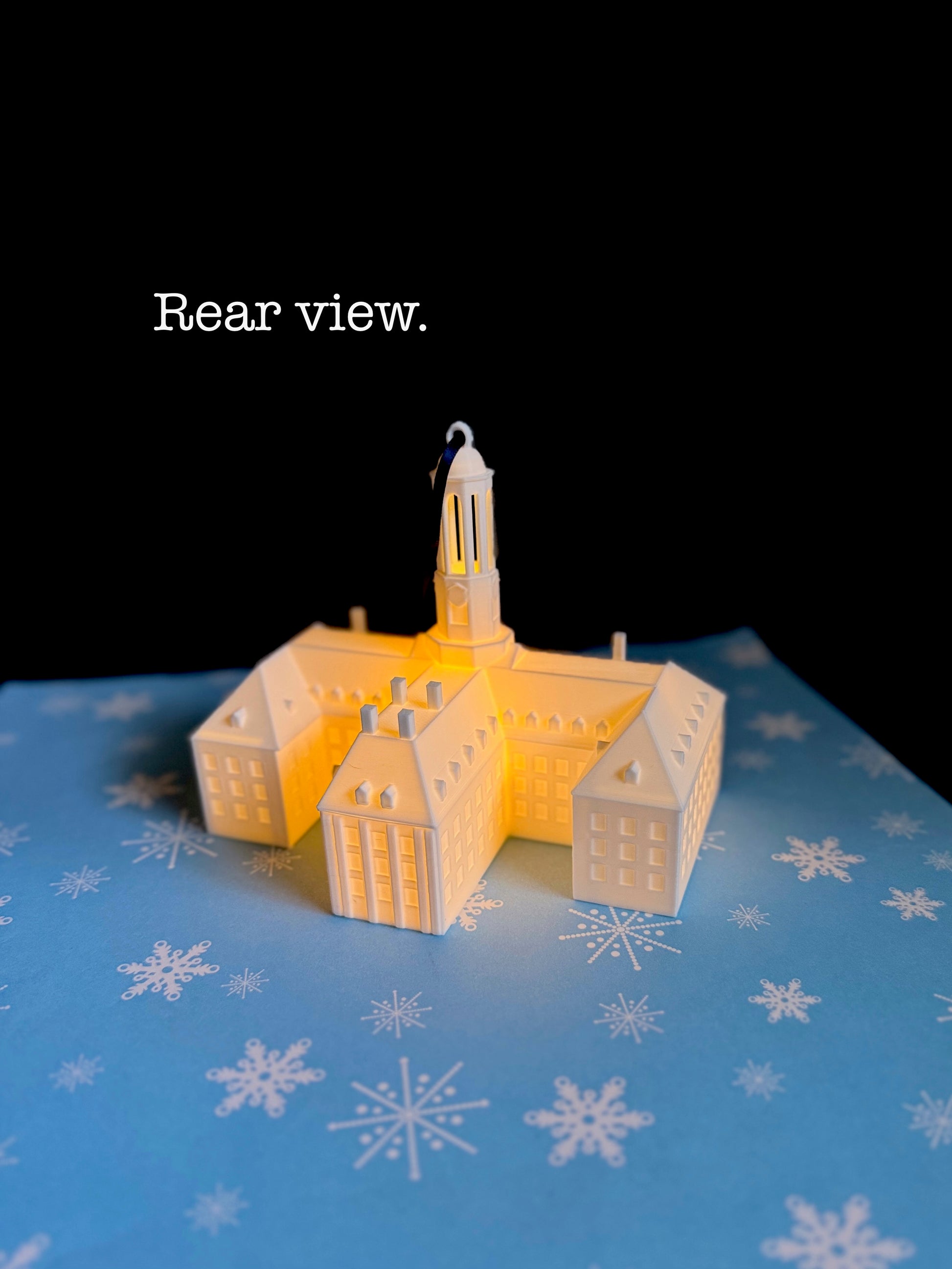 The Penn State Lighted ornament featuring the Old Main building.