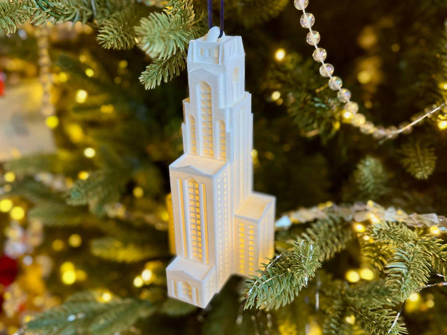 LED-lit 3D printed ornament of the University of Pittsburgh Cathedral of Learning.