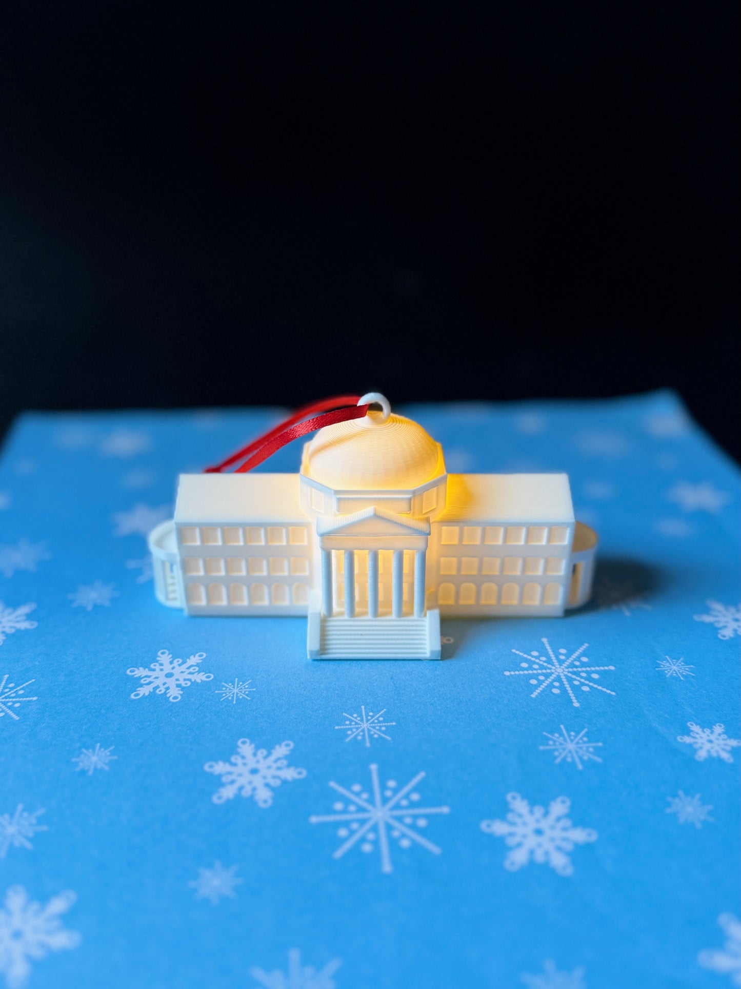 The Southern Methodist University Ornament depicting Dallas Hall and with an LED light.