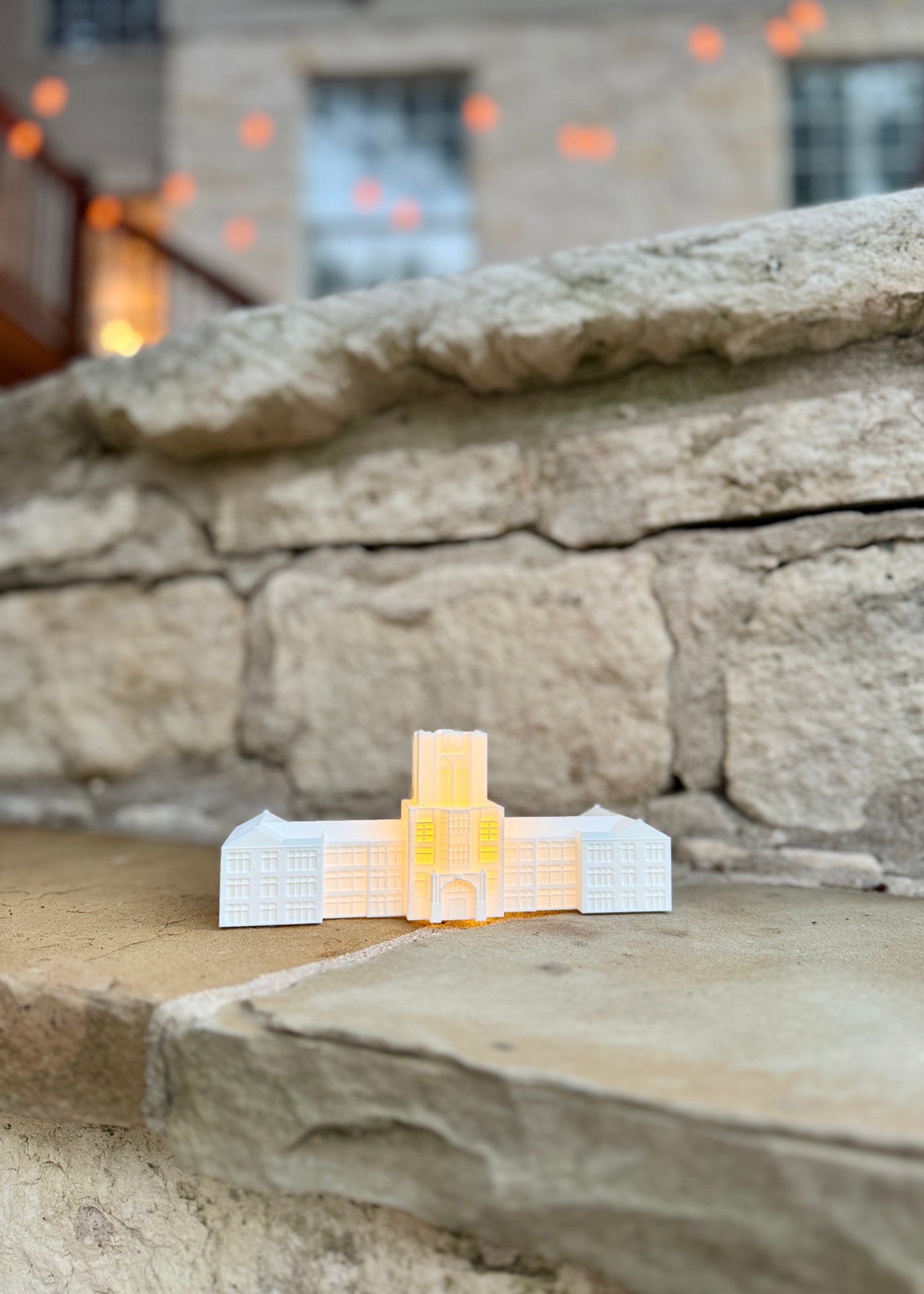 Tennessee Volunteers Party Decor designed as LED lighted figurines of Ayres Hall and shown at a party.