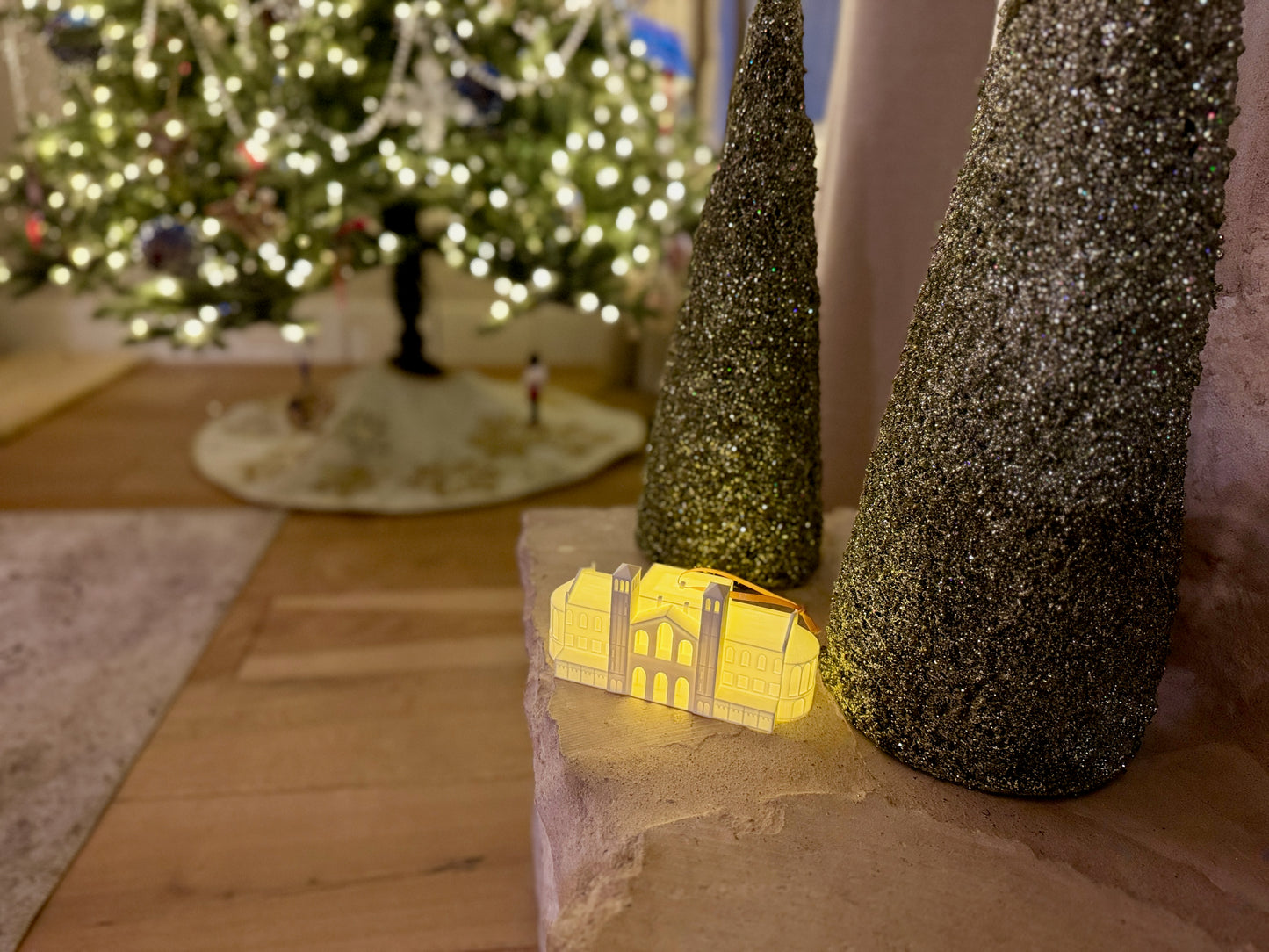 Detailed 3D printed UCLA Royce Hall ornament with warm LED illumination