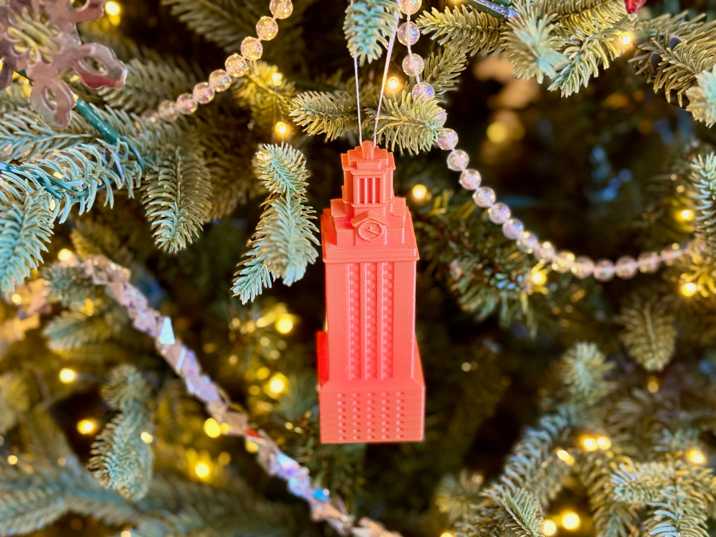 UT Austin ornament in burnt orange, depicting the University of Texas Tower.