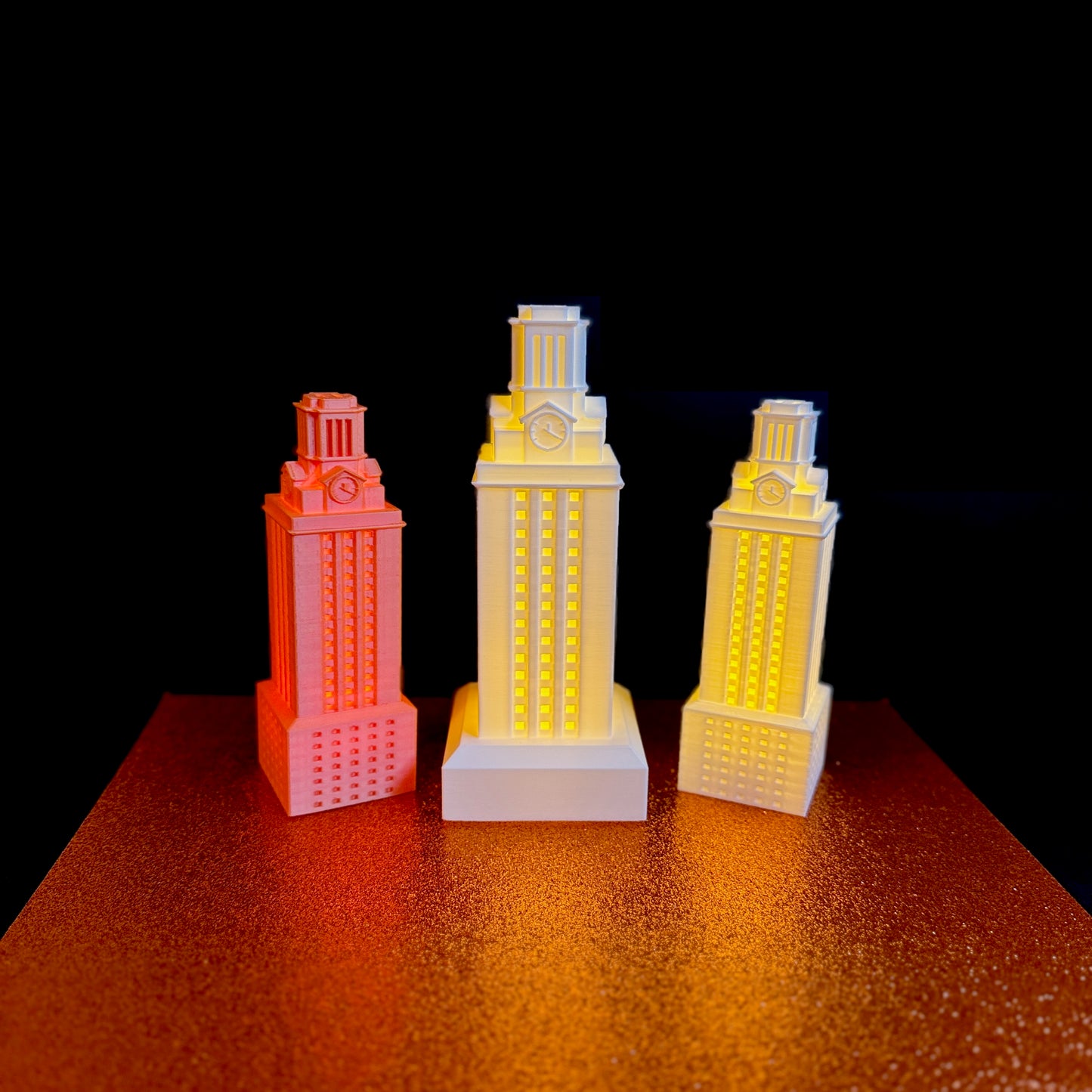 The lights designed as replicas of the UT Tower in Austin.