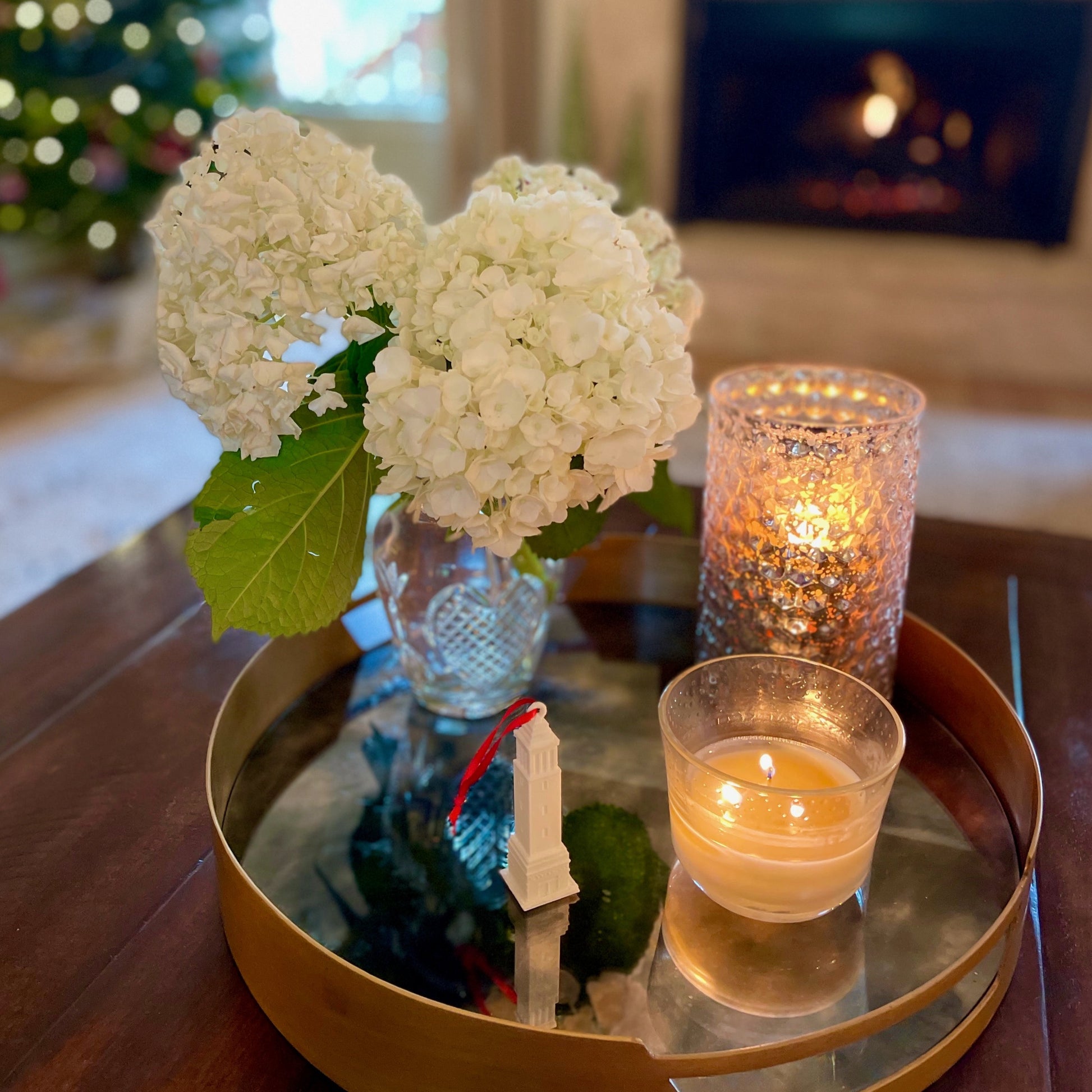 The University of Alabama Denny Chimes ornament shown in a home decorated for Christmas.