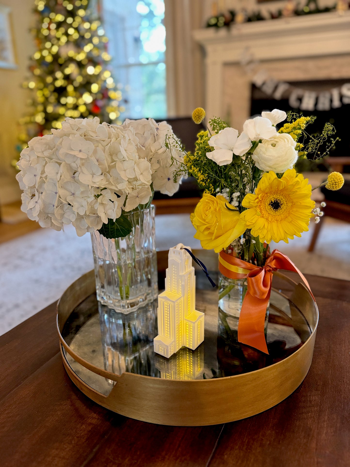 The University of Pittsburgh ornament shown in a home decorated for the Holidays.