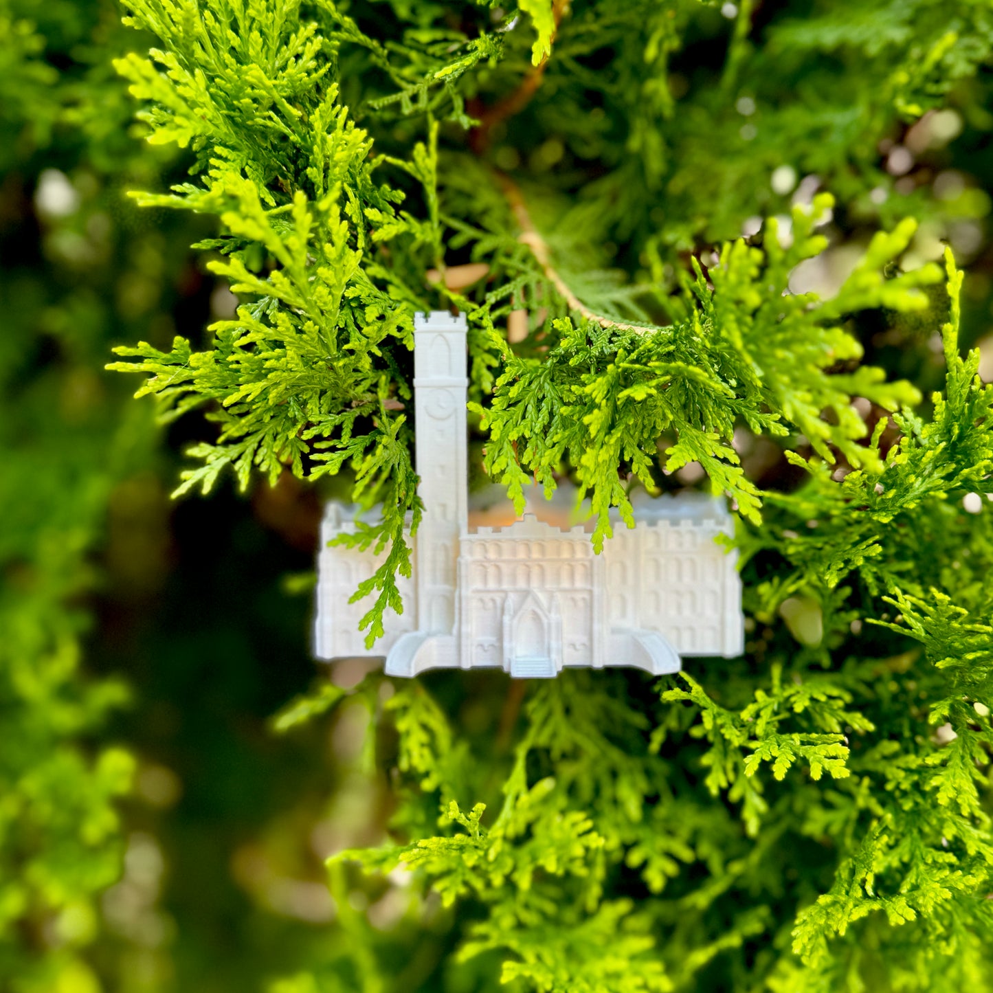 The Vanderbilt University ornament, shown on a tree decorated for Christmas.