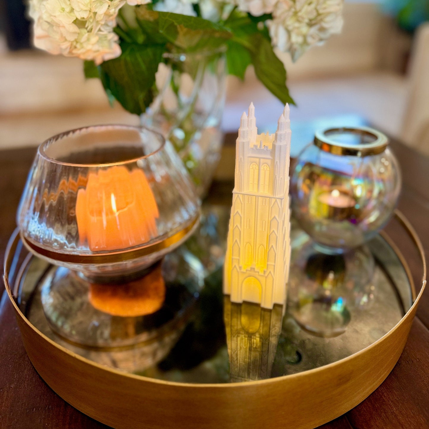 The Duke Chapel keepsake, shown on a living room side table.