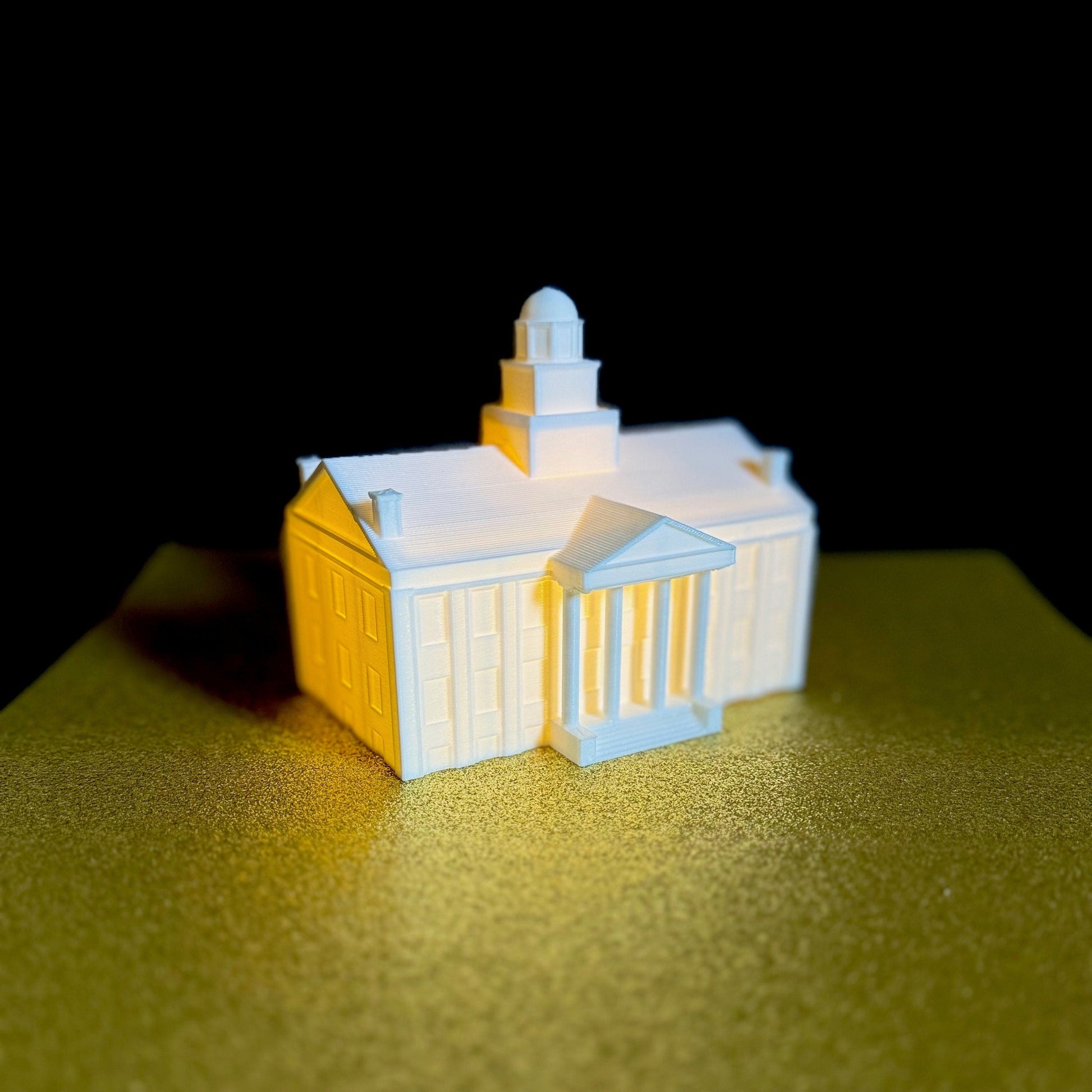 The lighted University of Iowa figurine, designed in honor of the Iowa Old Capitol.