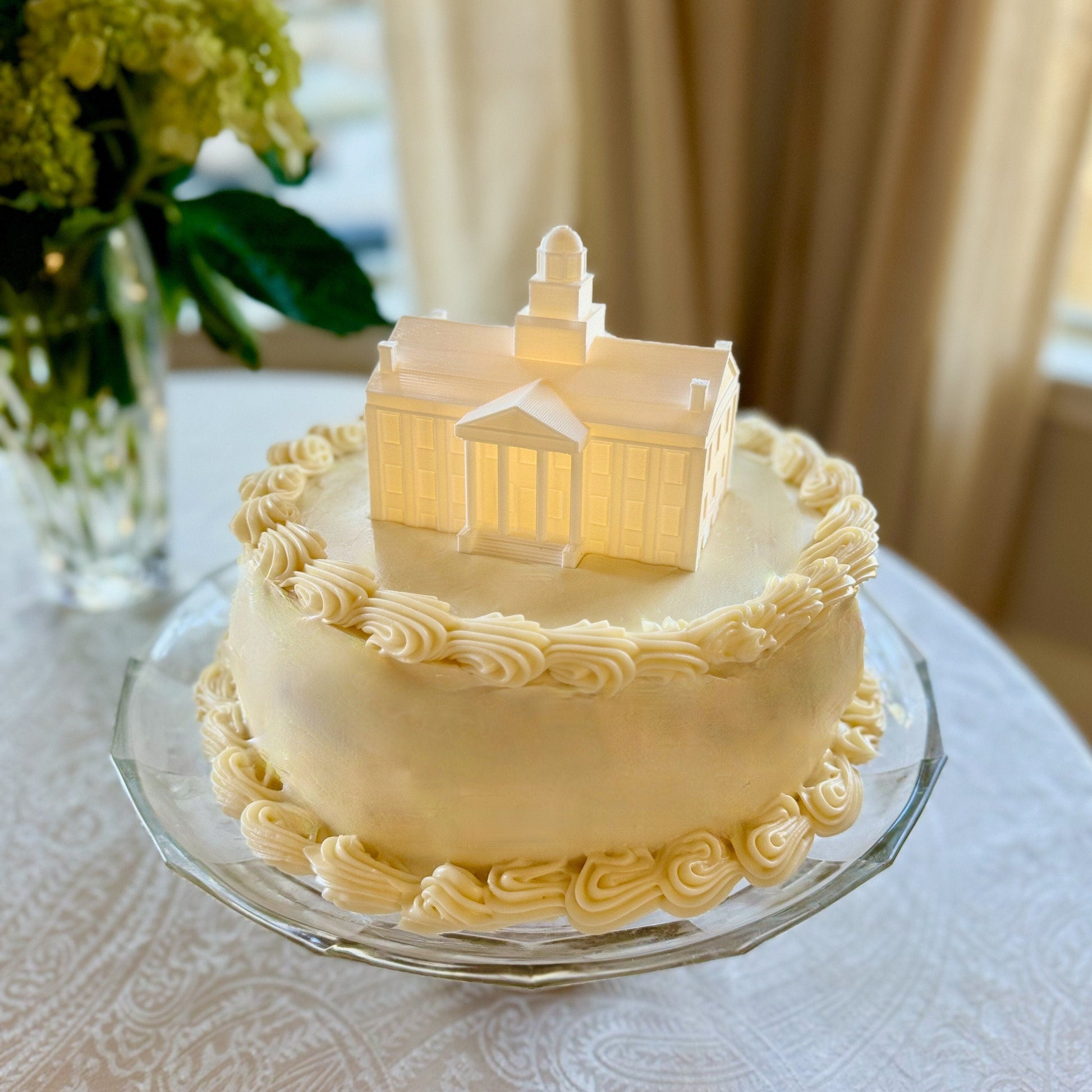 The Iowa Hawkeyes figurine, used as a cake topper on a University of Iowa graduation cake.