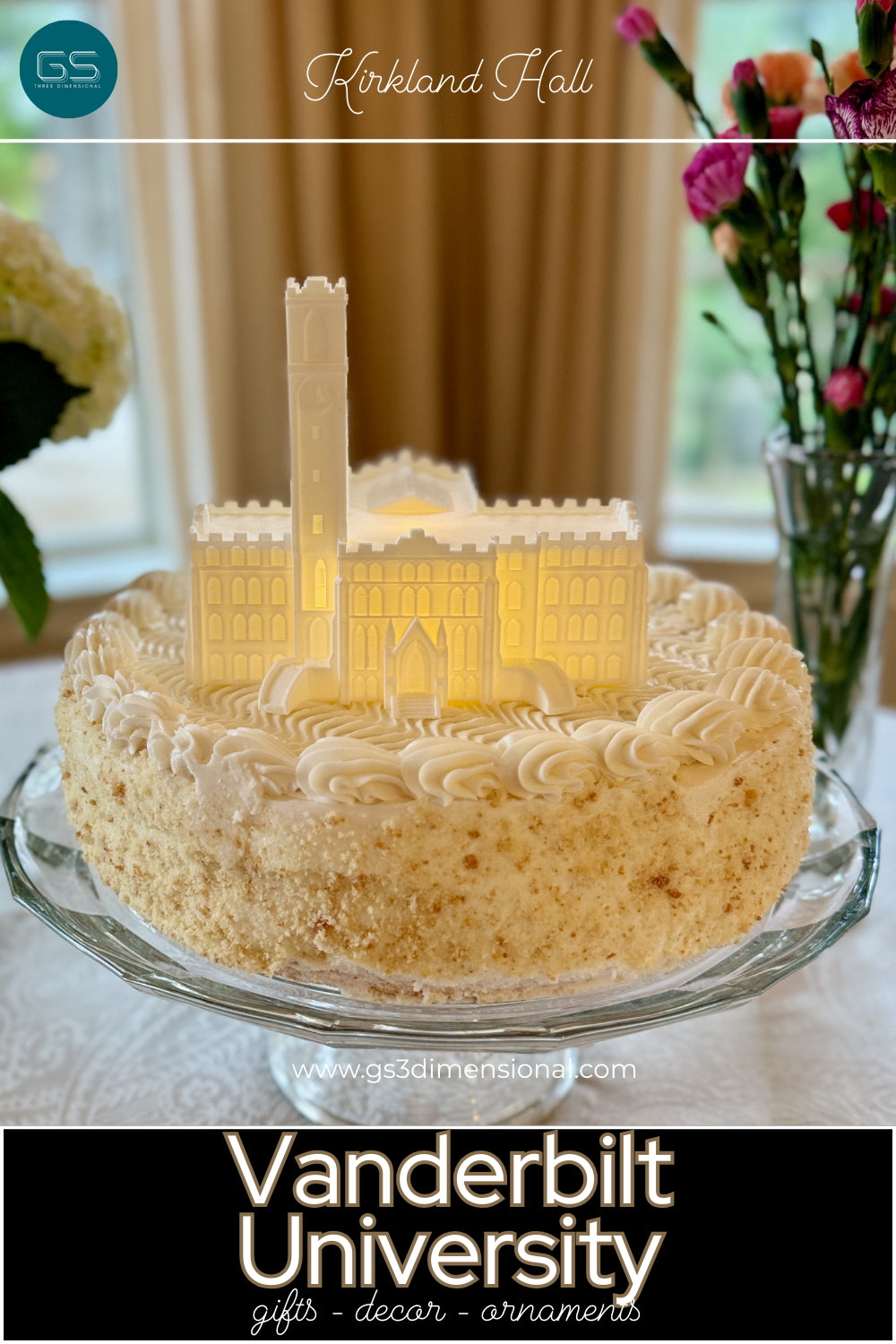 Decorative cake with a lighted Vanderbilt Cake topper featuring the Kirkland Hall building, displayed on a cake that could be for a graduation or a wedding.