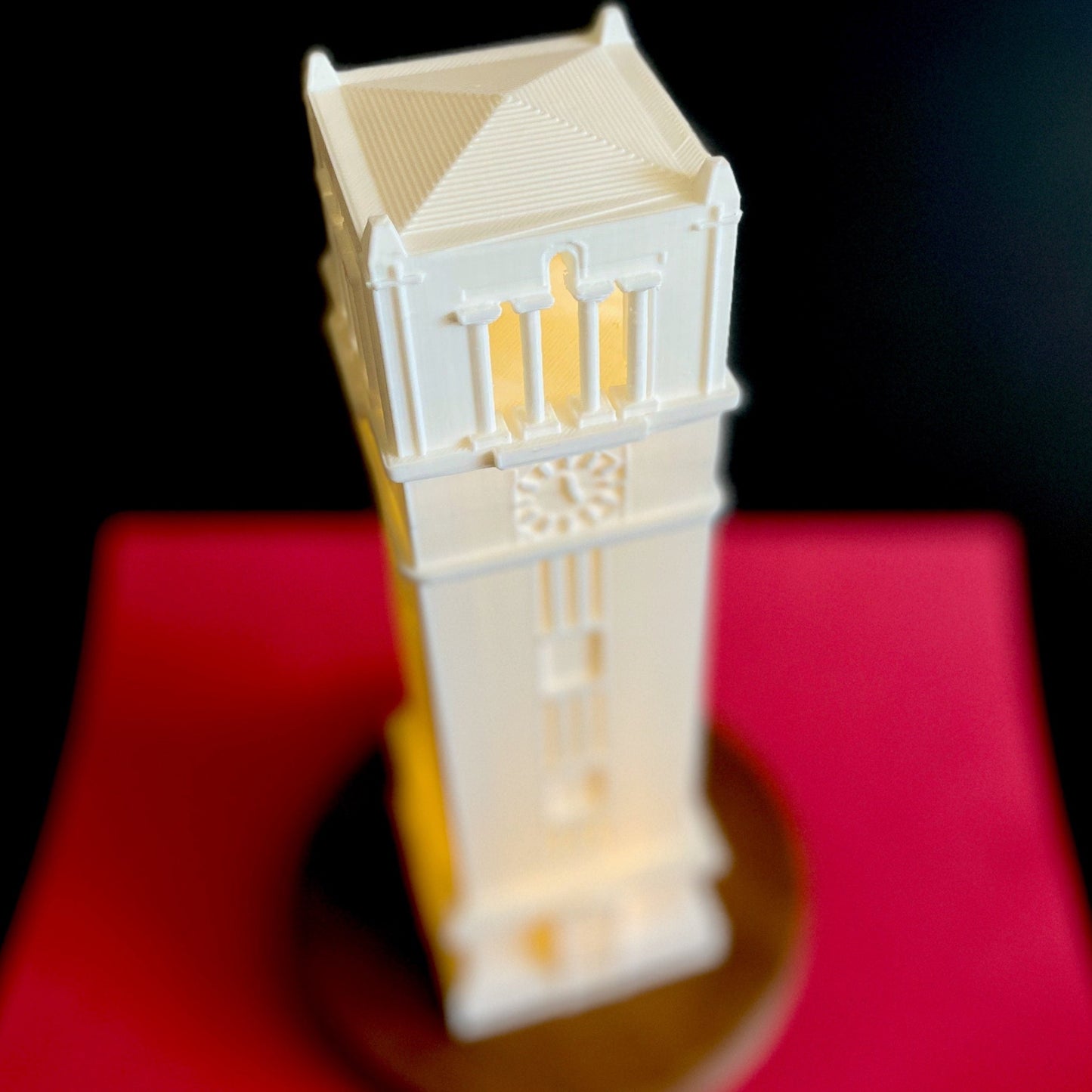 Top view of the lighted NC State Bell Tower lamp.