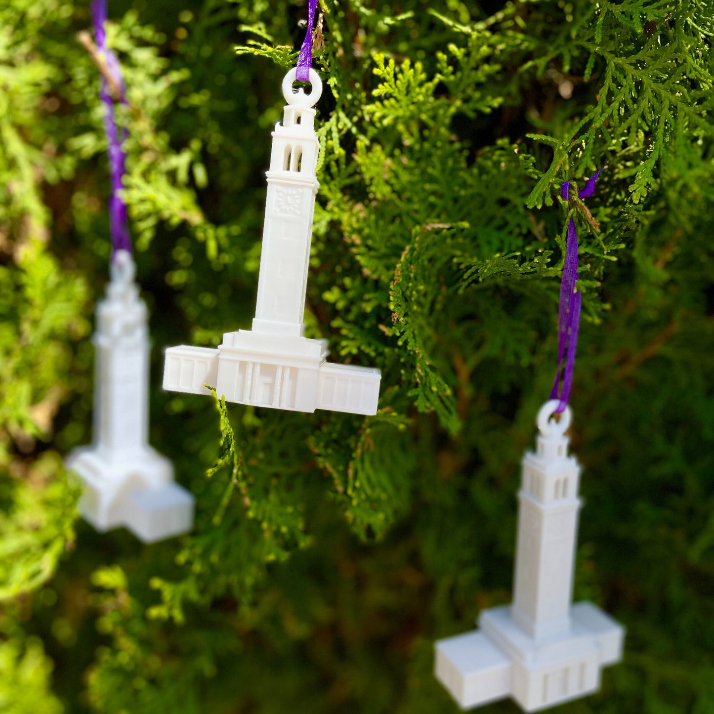 Multiple LSU ornaments shown on an LSU Christmas tree.