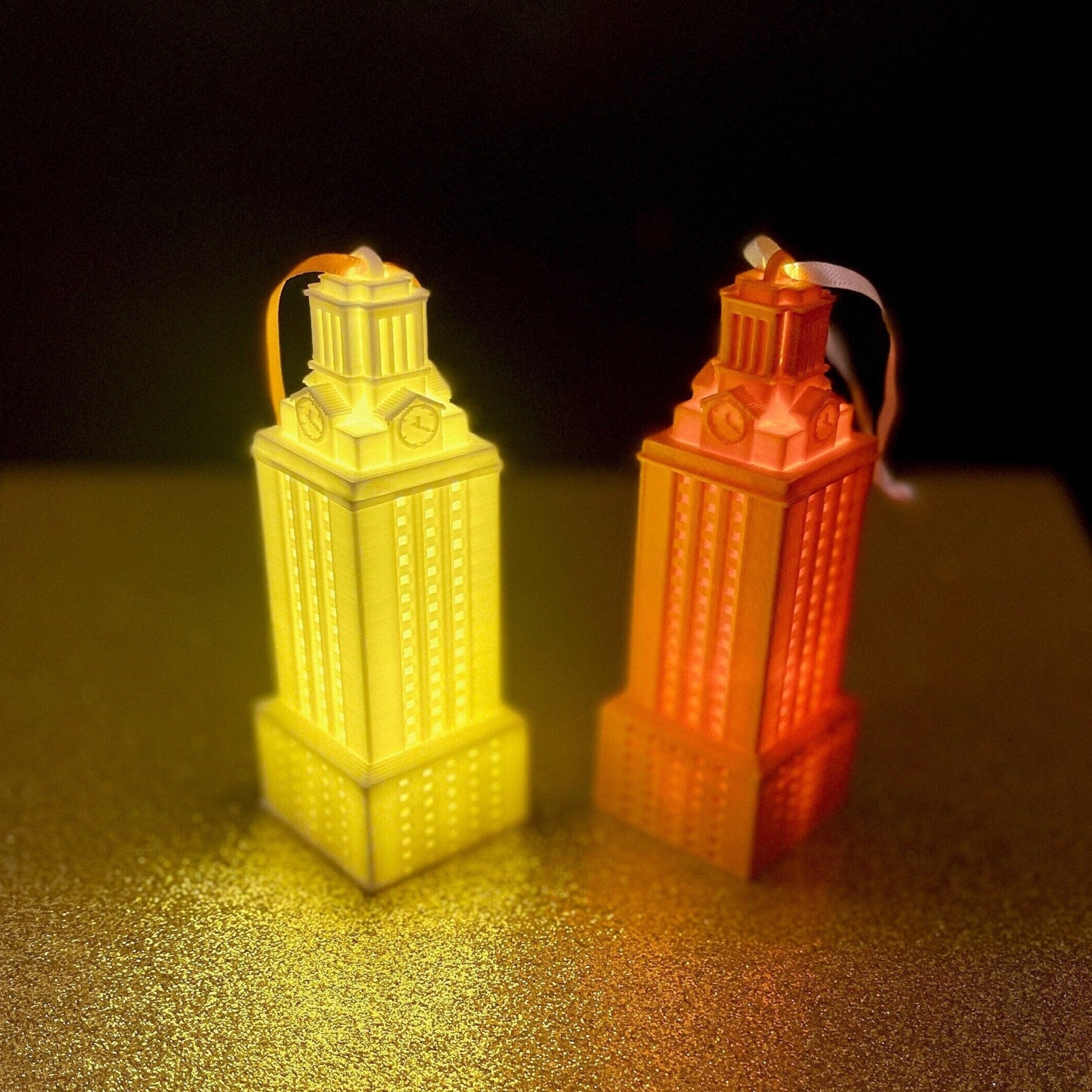 The lighted University of Texas ornaments, shown in white and burnt orange.