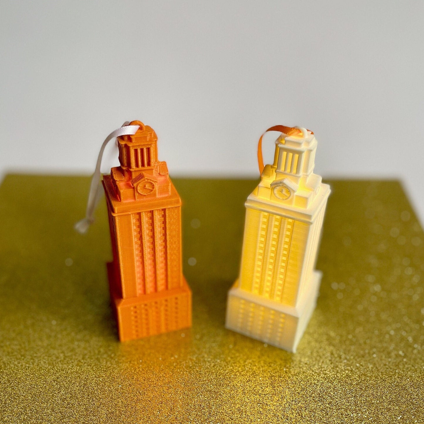 The lighted UT Austin ornaments, shown in white and burnt orange.